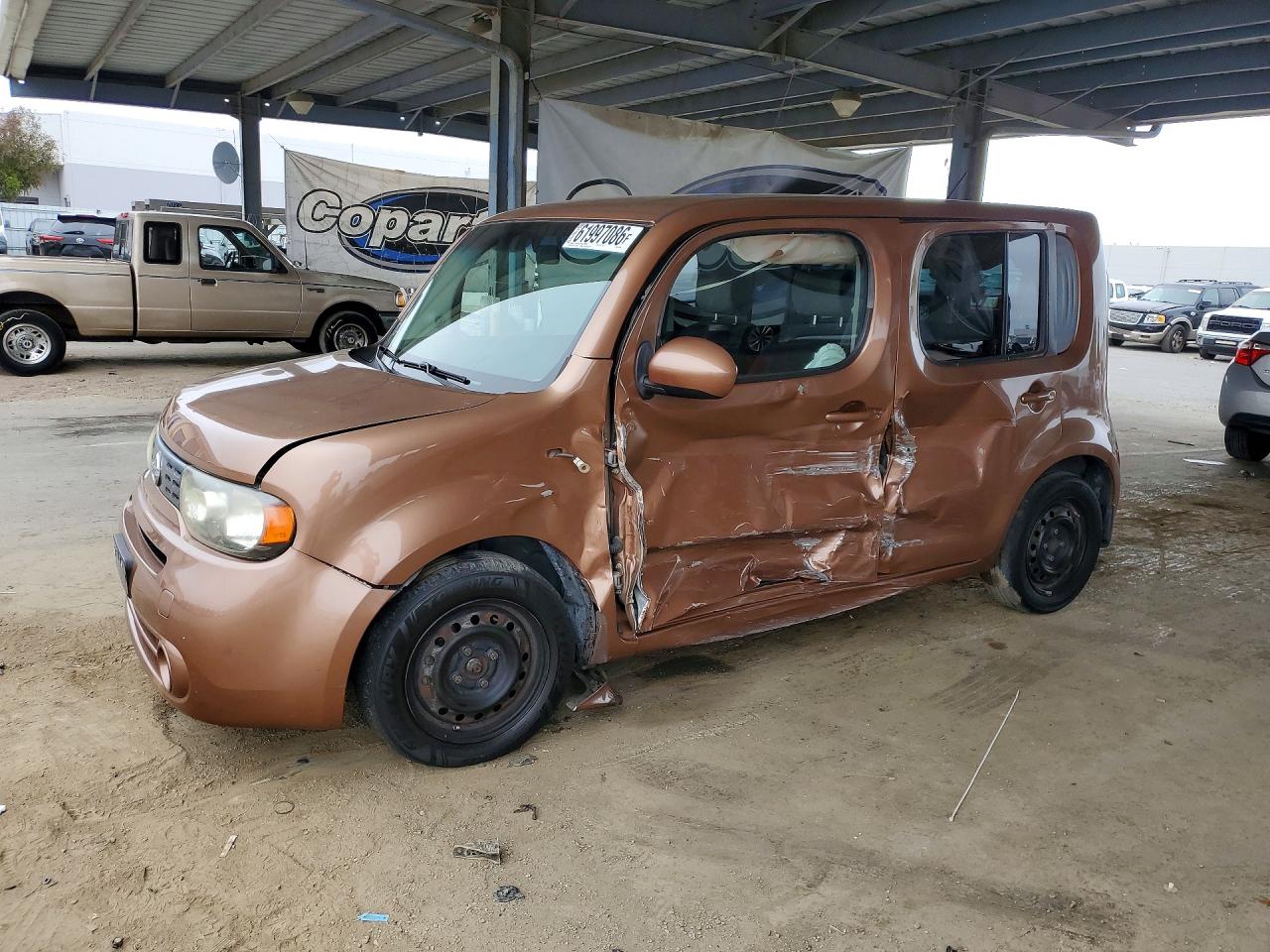 2011 Nissan Cube 1.8 Коричневый vin: JN8AZ2KR0BT212940
