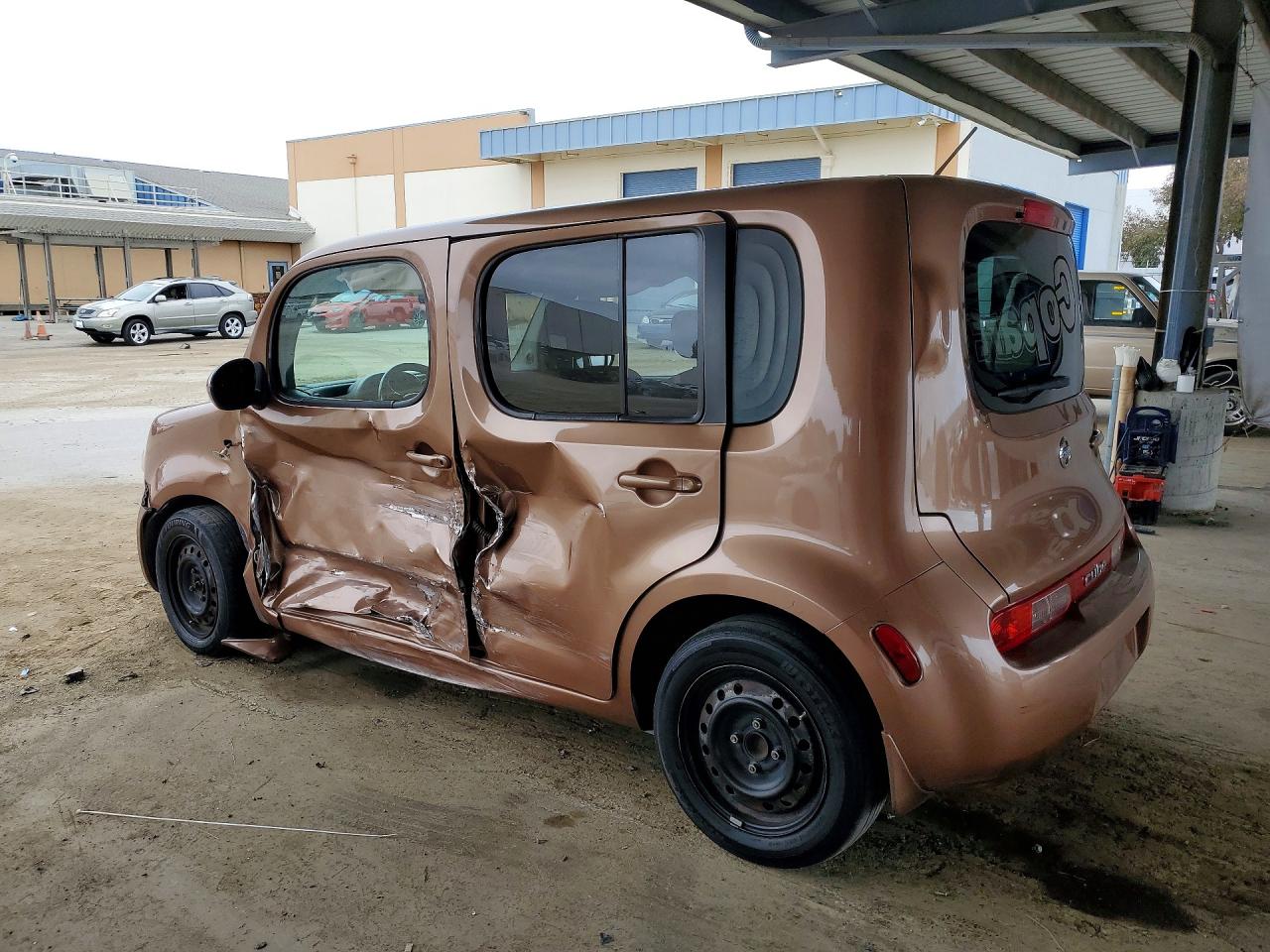 2011 Nissan Cube 1.8 Коричневый vin: JN8AZ2KR0BT212940