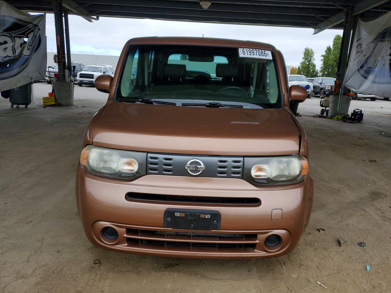 2011 Nissan Cube 1.8 Коричневый vin: JN8AZ2KR0BT212940