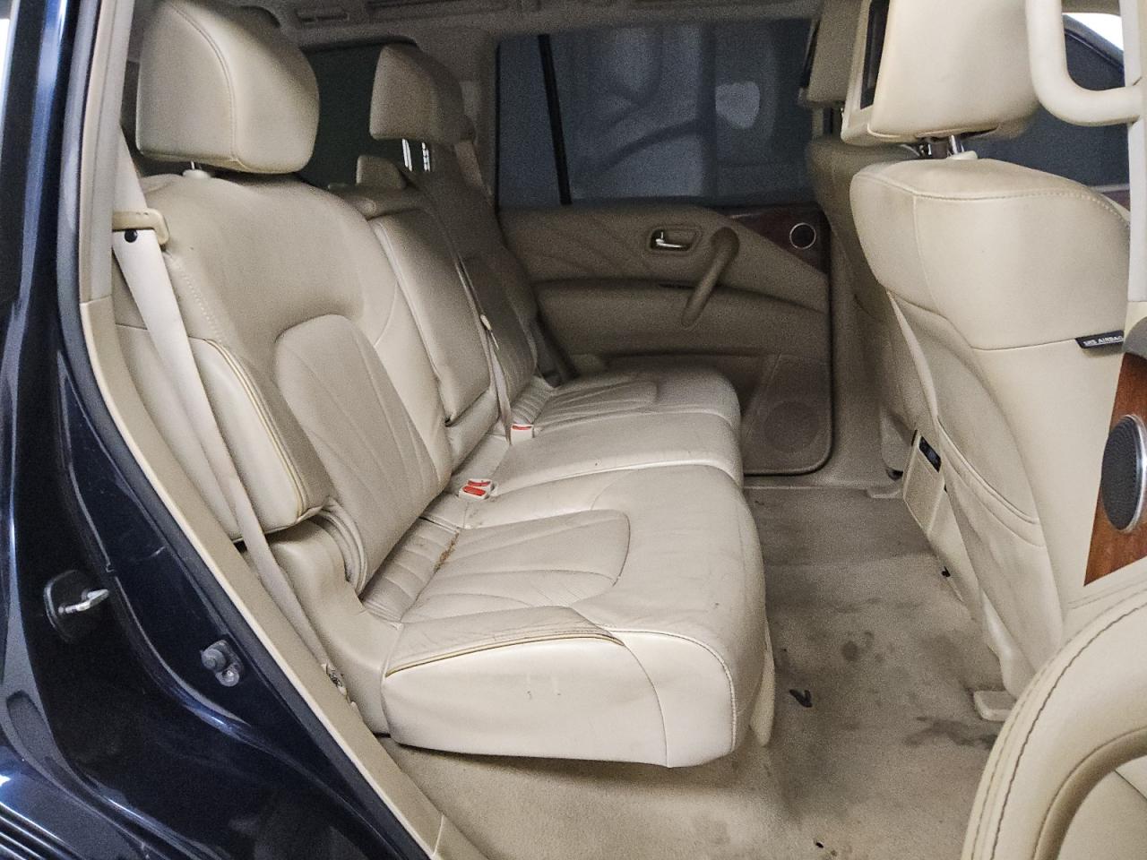 2015 Infiniti Qx80 Base Blue vin: JN8AZ2ND3F9770607 Damage: Right Rear Carpet, Stained, Permanent