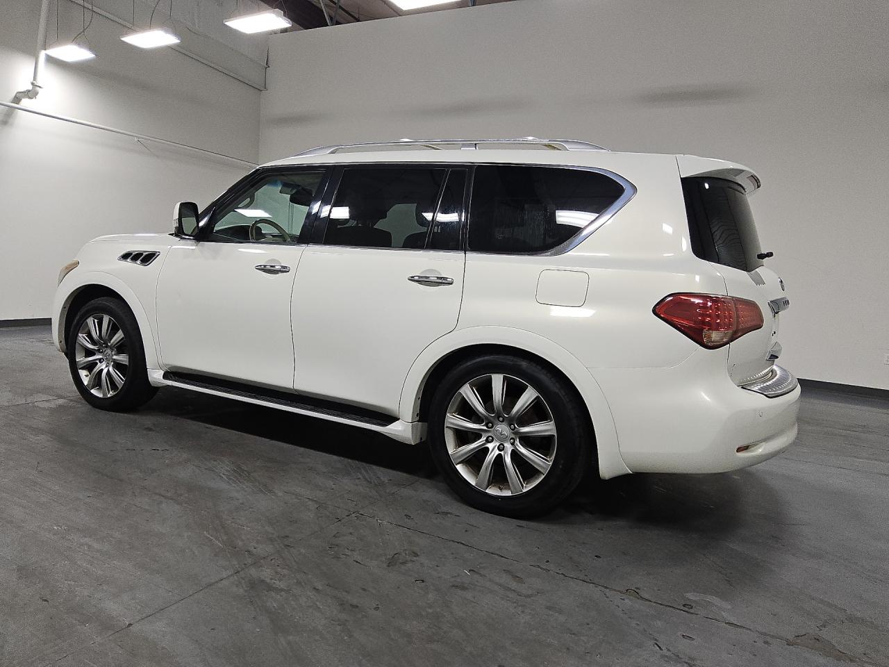 2013 Infiniti Qx56 Base White vin: JN8AZ2NE9D9040481 Damage: Left Front Tire, Worn, Replacement Required