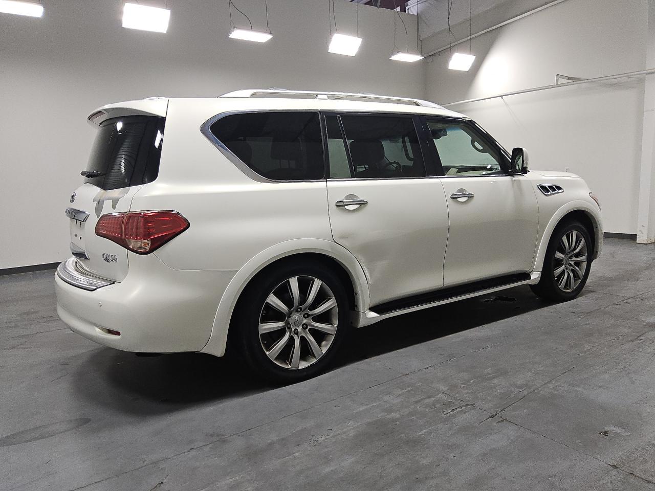 2013 Infiniti Qx56 Base White vin: JN8AZ2NE9D9040481 Damage: Right Front Tire, Worn, Replacement Required