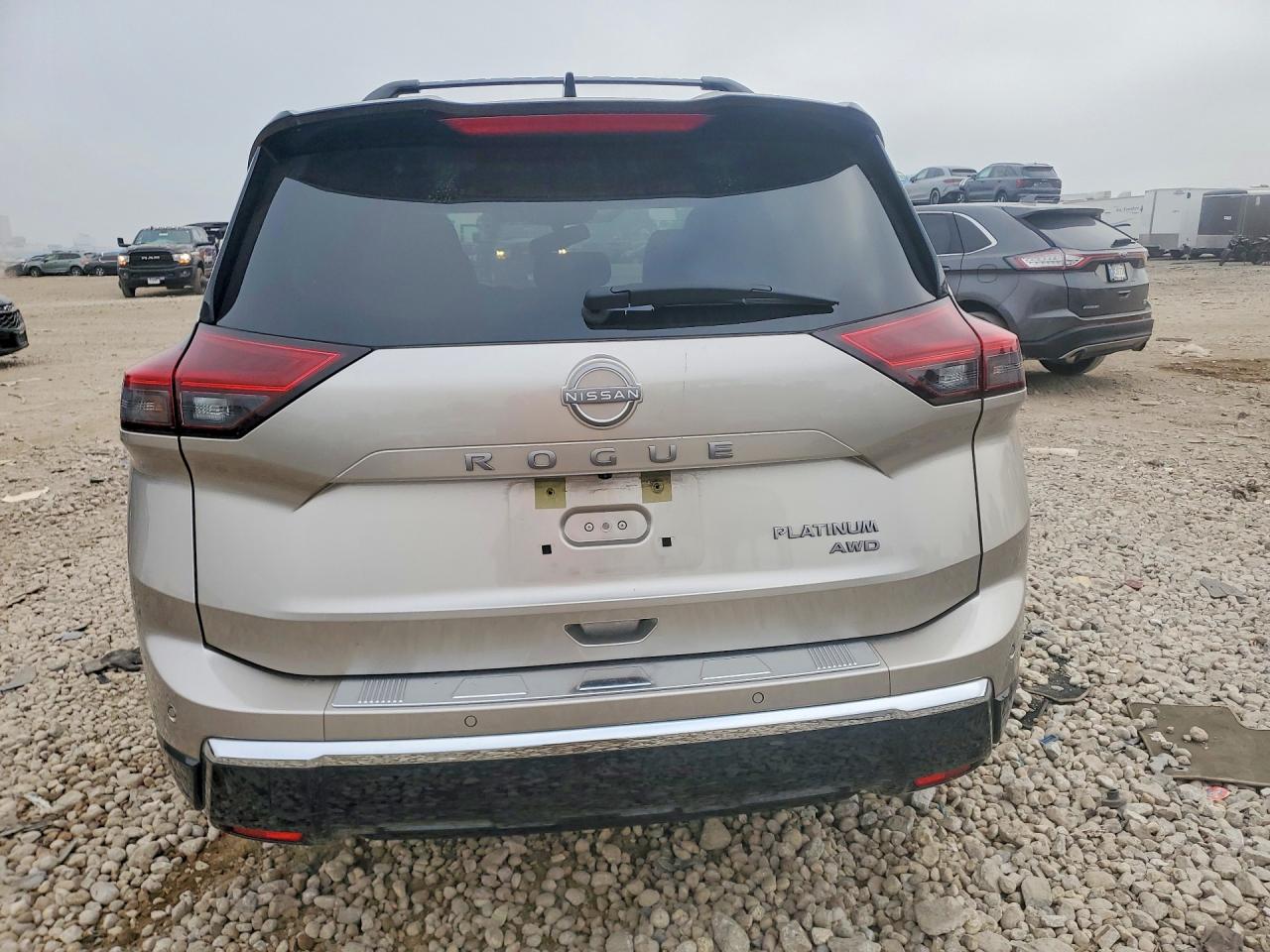 2025 Nissan Rogue Platinum Gold vin: JN8BT3DDXSW470247