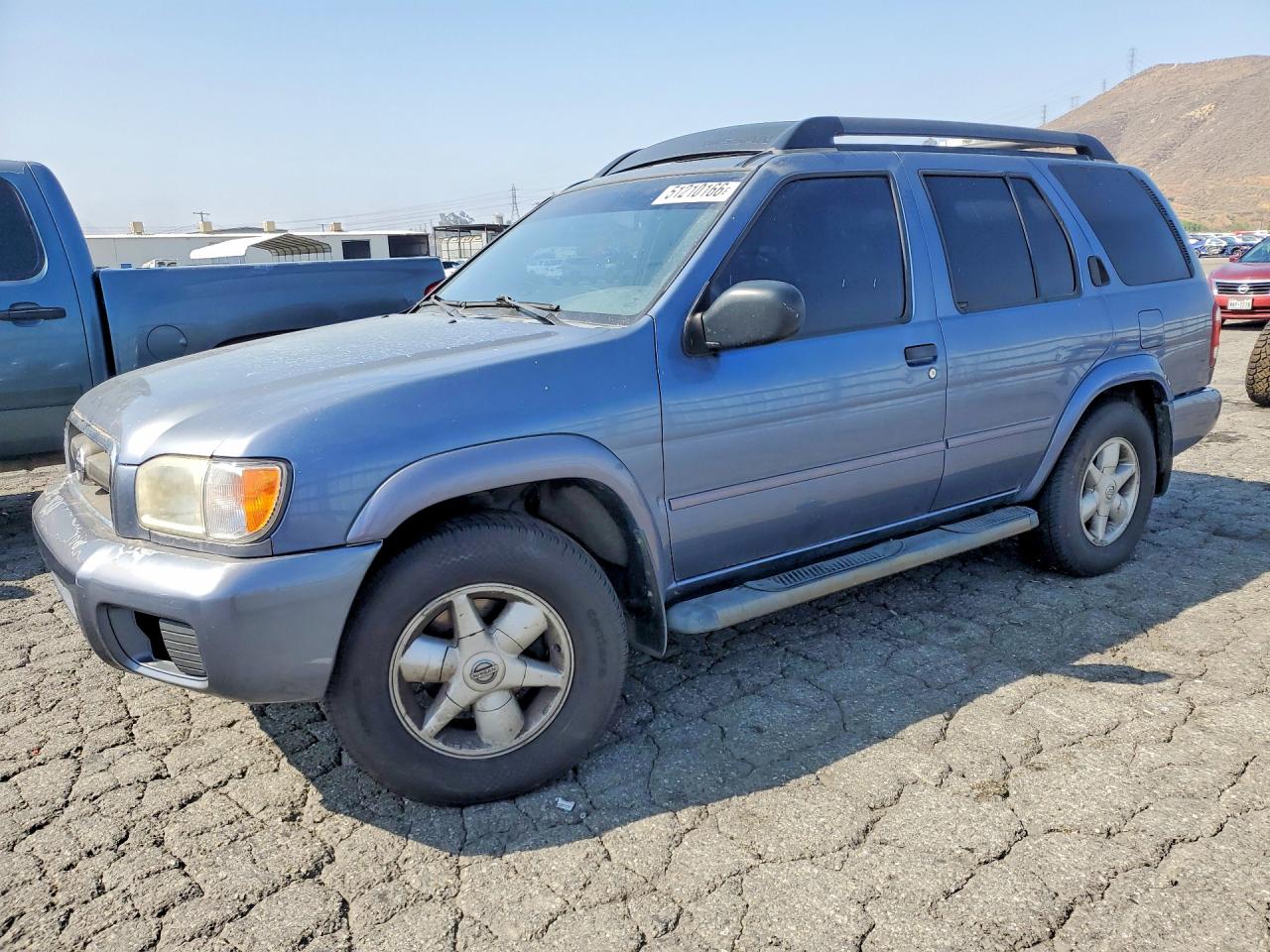 2002 Niss Pathfinder Blue vin: JN8DR09X62W652410