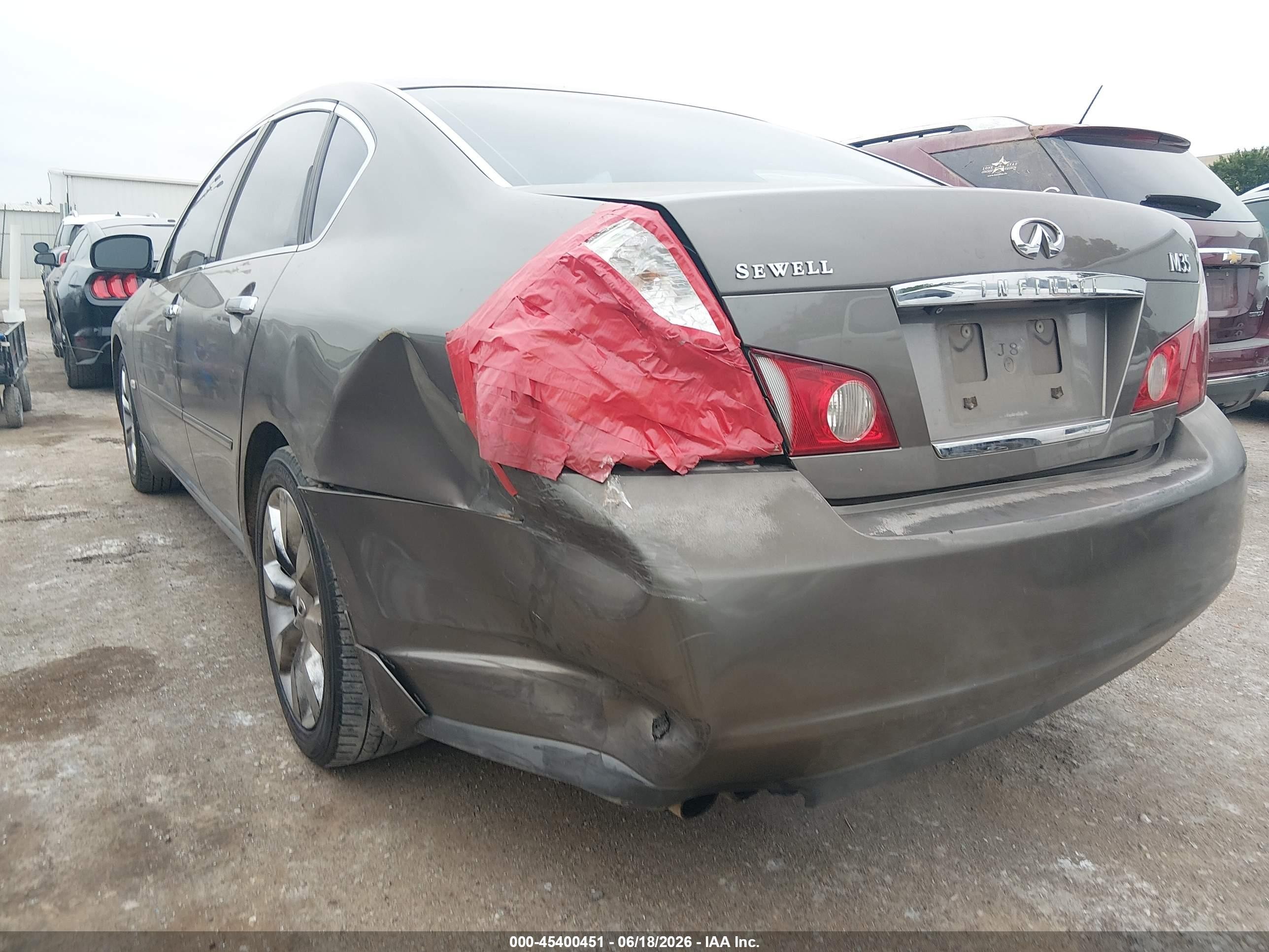 2007 Infiniti M35   Tan vin: JNKAY01E37M306831
