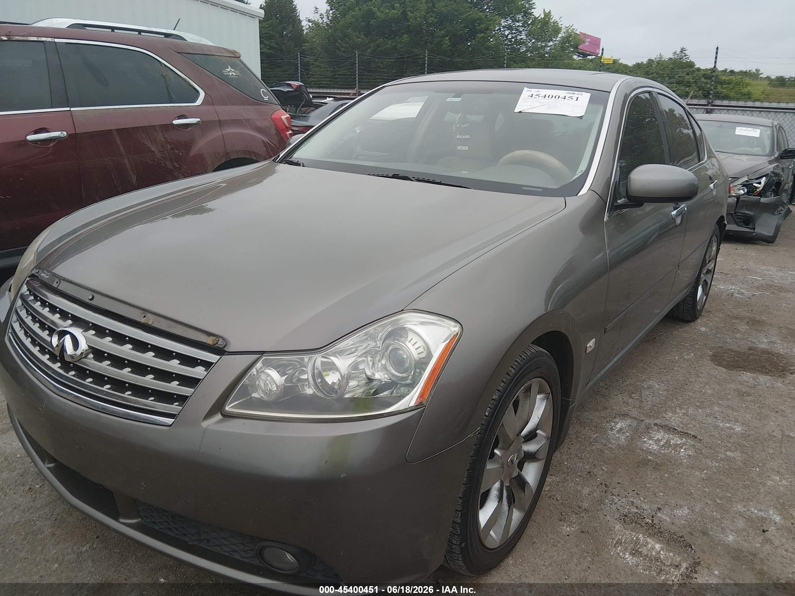 2007 Infiniti M35   Tan vin: JNKAY01E37M306831