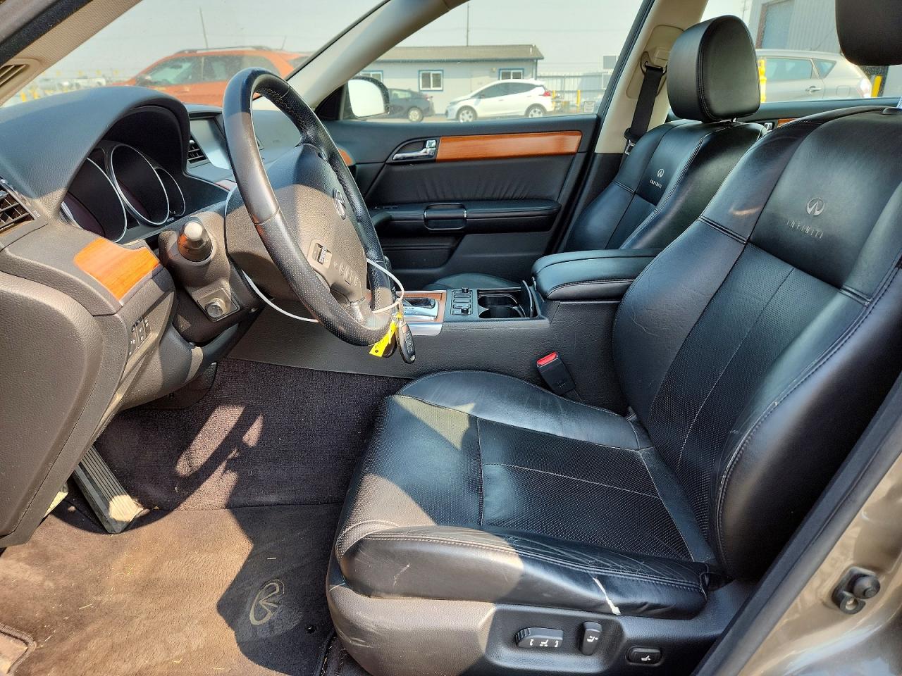 2006 Infiniti M35 Base Gold vin: JNKAY01F06M261273