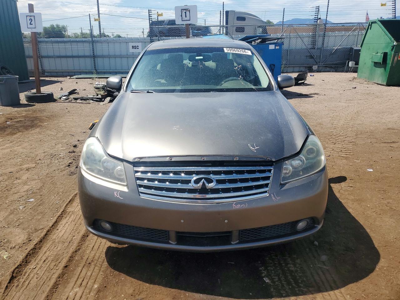 2006 Infiniti M35 Base Gold vin: JNKAY01F26M266409