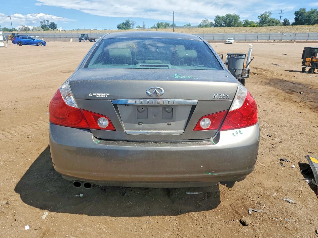 2006 Infiniti M35 Base Gold vin: JNKAY01F26M266409