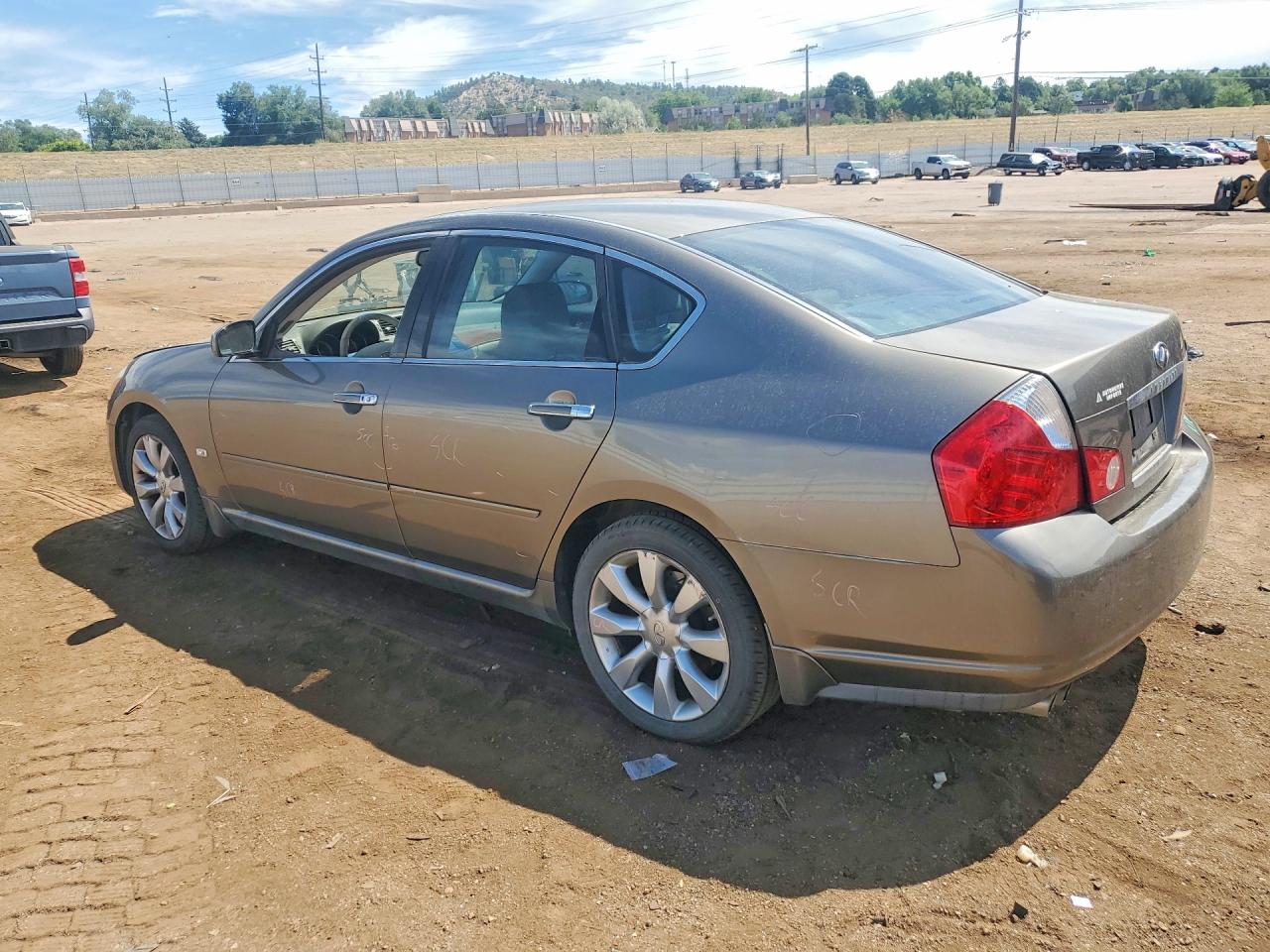 2006 Infiniti M35 Base Gold vin: JNKAY01F26M266409