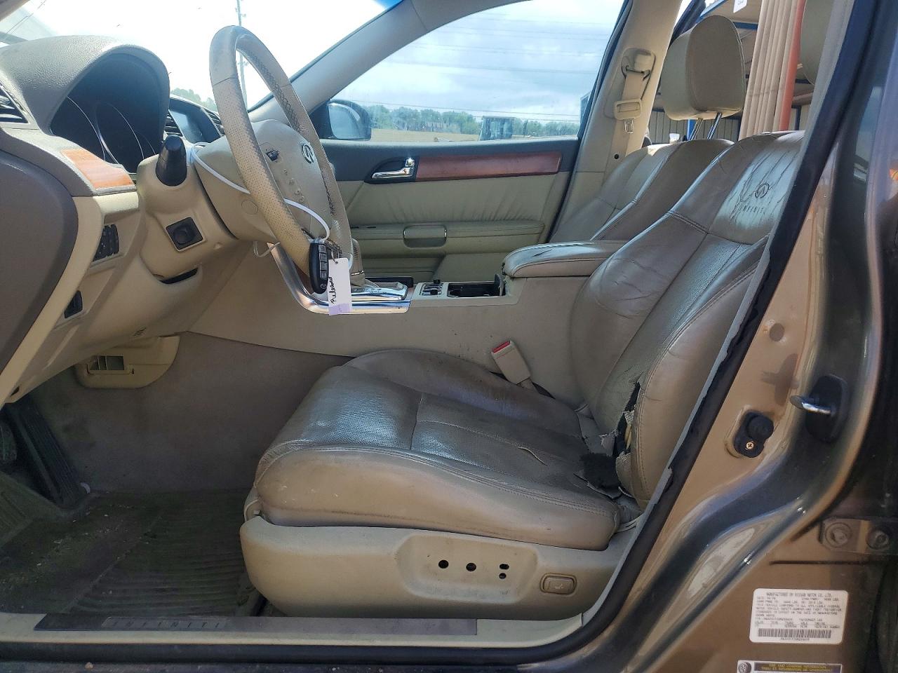 2006 Infiniti M35 Base Gold vin: JNKAY01F26M266409
