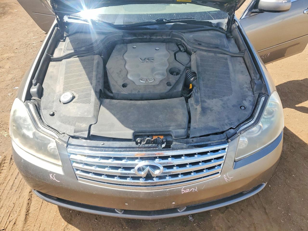 2006 Infiniti M35 Base Gold vin: JNKAY01F26M266409