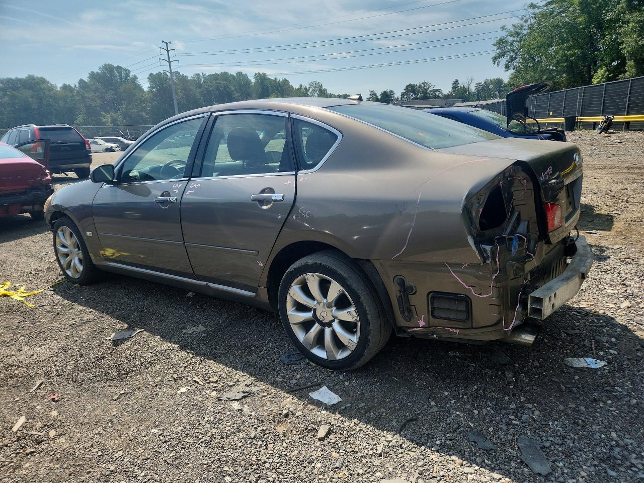 2006 Infiniti M35 Base Gold vin: JNKAY01F76M262159