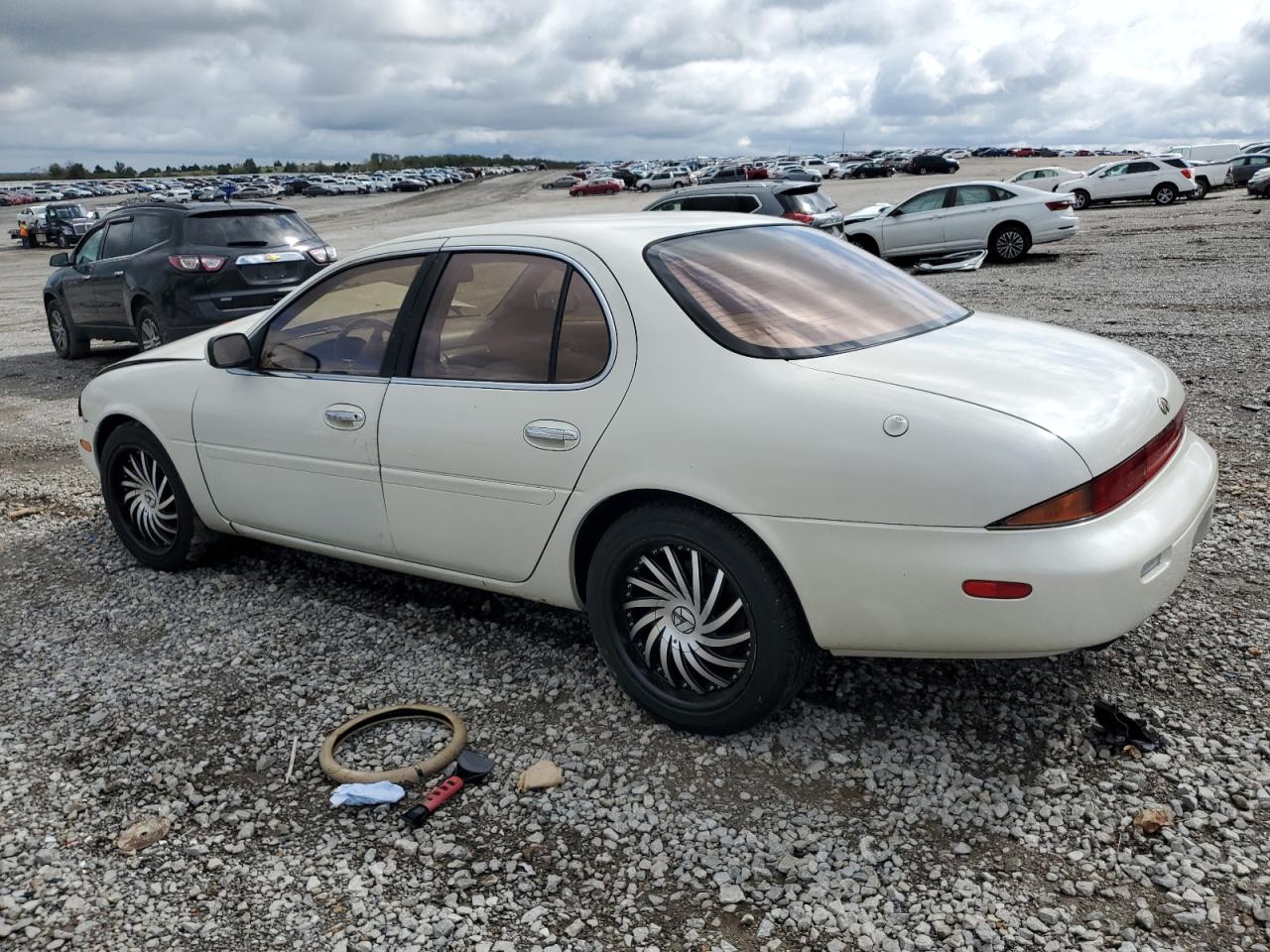1997 Infiniti J30 Cream vin: JNKAY21D1VM401386