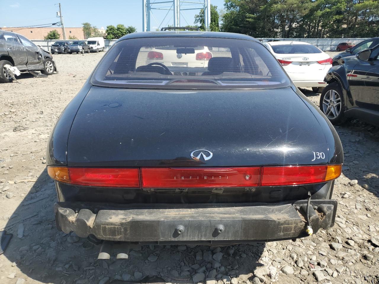 1993 Infiniti J30    Black vin: JNKAY21D3PM007553