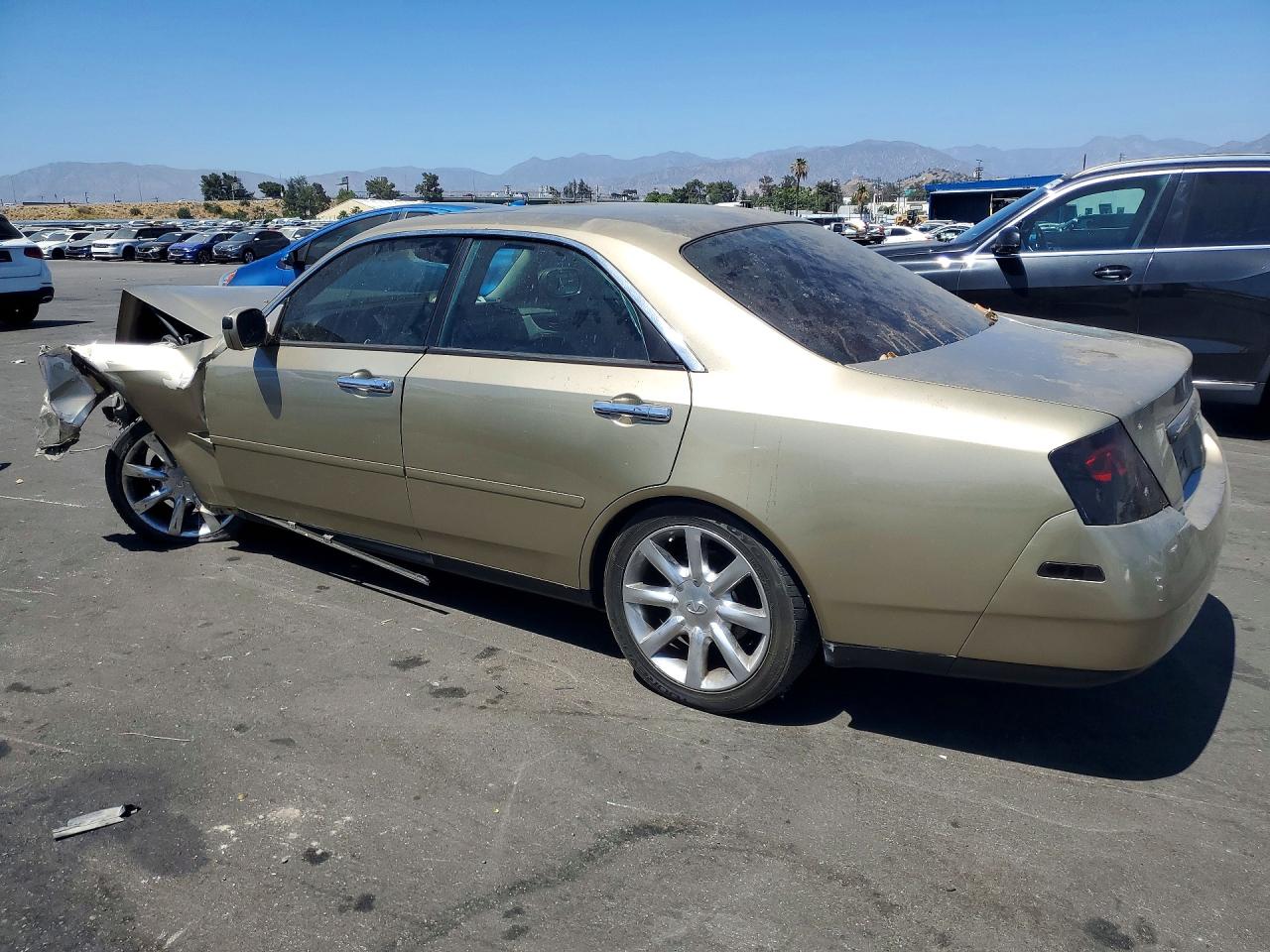 2003 Infiniti M45 Base Gold vin: JNKAY41E03M003698