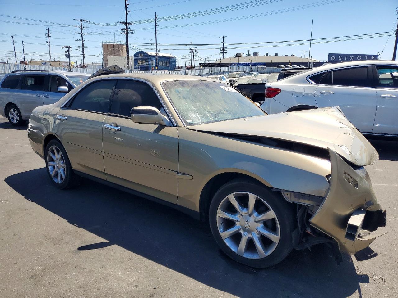 2003 Infiniti M45 Base Gold vin: JNKAY41E03M003698