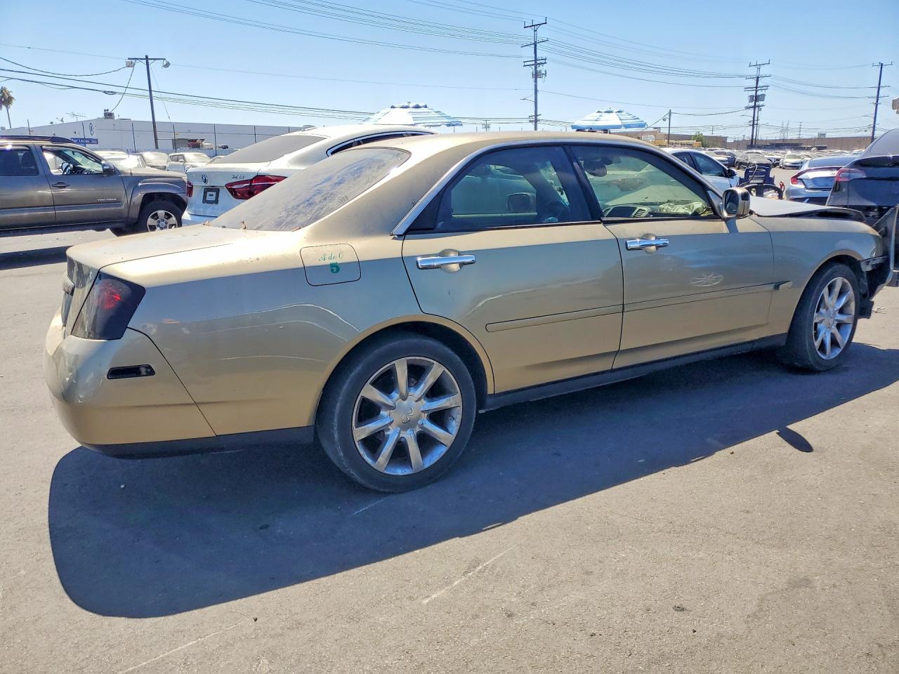 2003 Infiniti M45 Base Gold vin: JNKAY41E03M003698