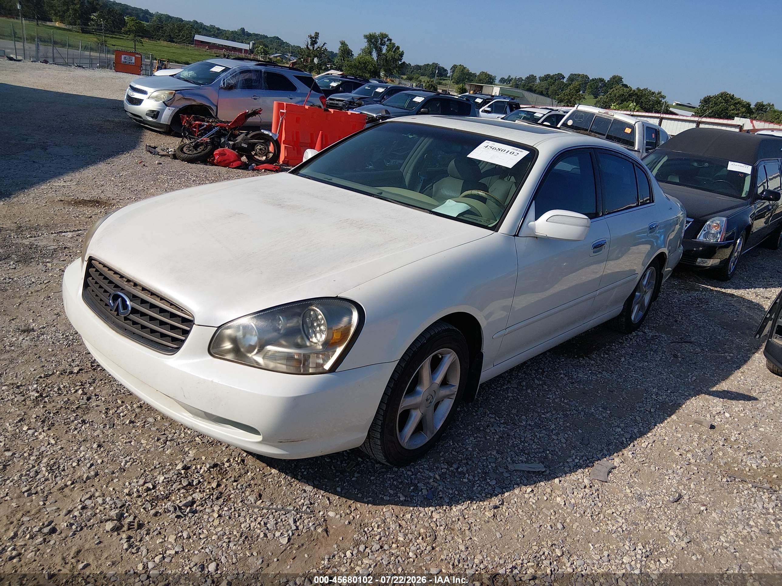 2002 Infiniti Q45 Luxury White vin: JNKBF01A42M000883