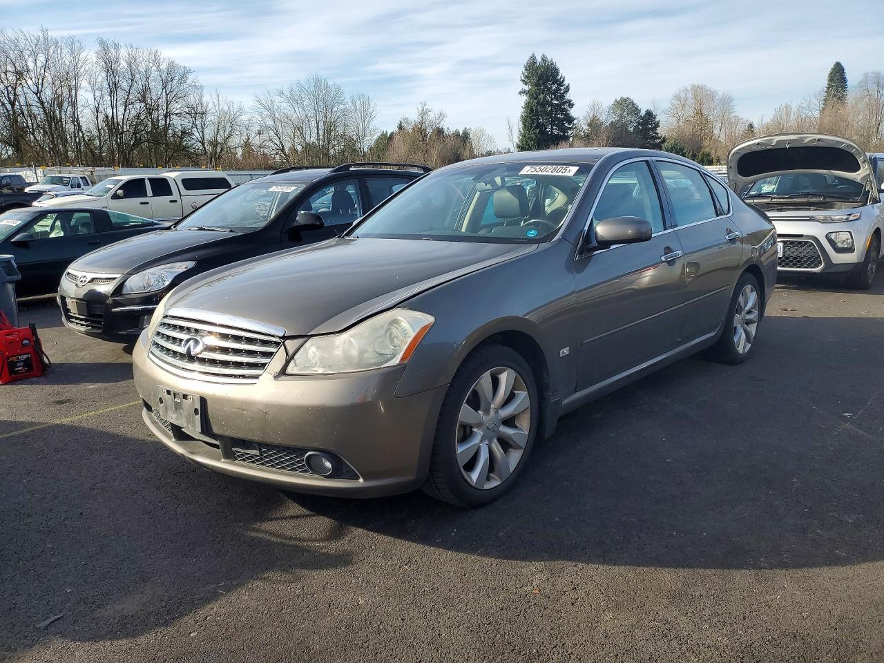 2006 Infiniti M45 Base Gold vin: JNKBY01E26M208232