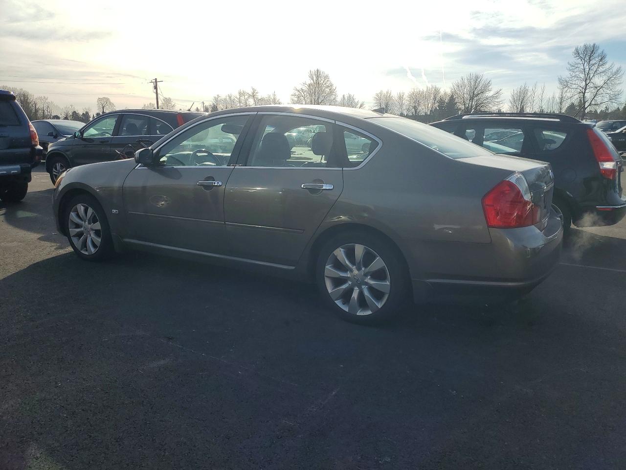 2006 Infiniti M45 Base Золотой vin: JNKBY01E26M208232