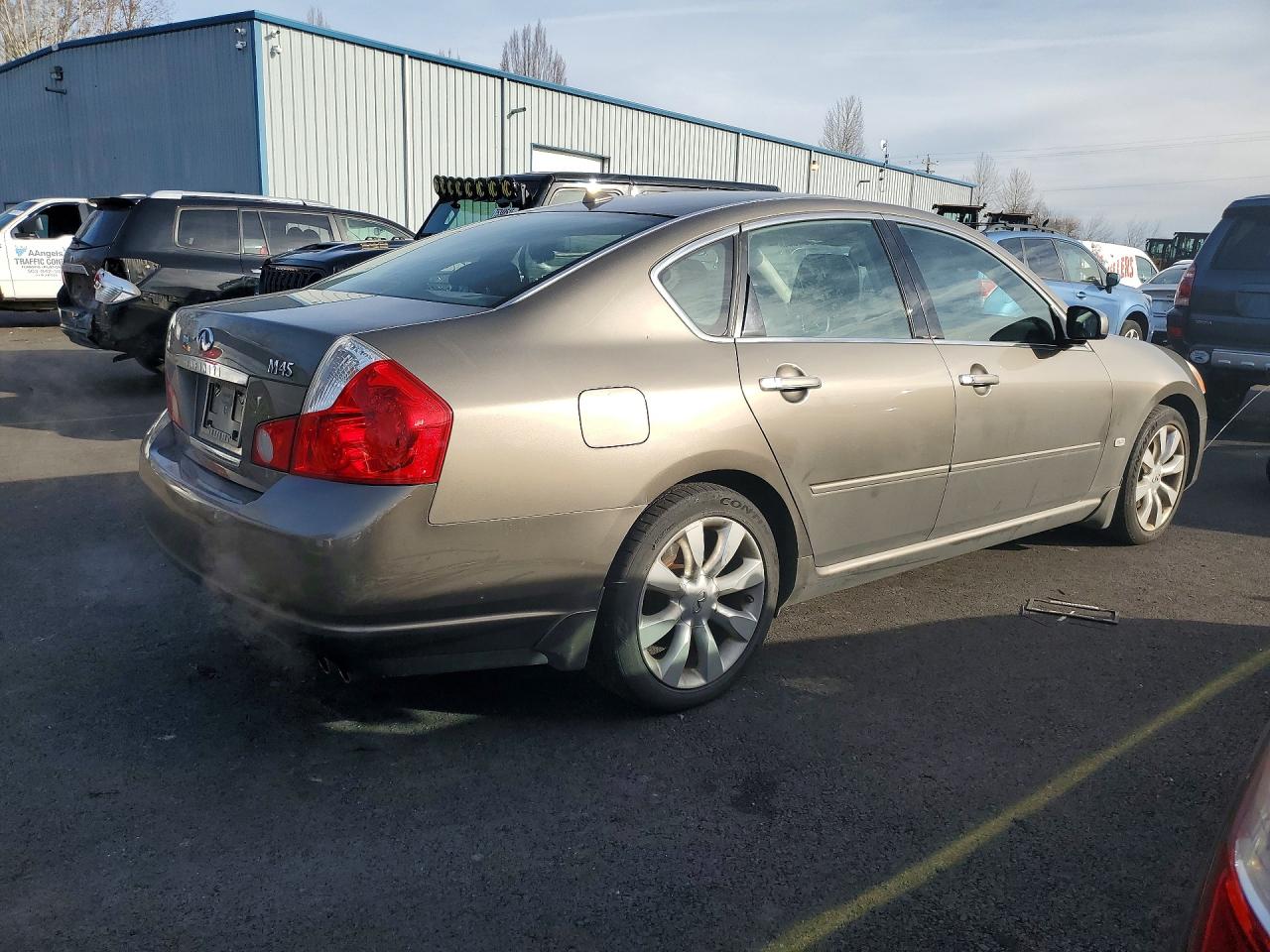 2006 Infiniti M45 Base Золотой vin: JNKBY01E26M208232