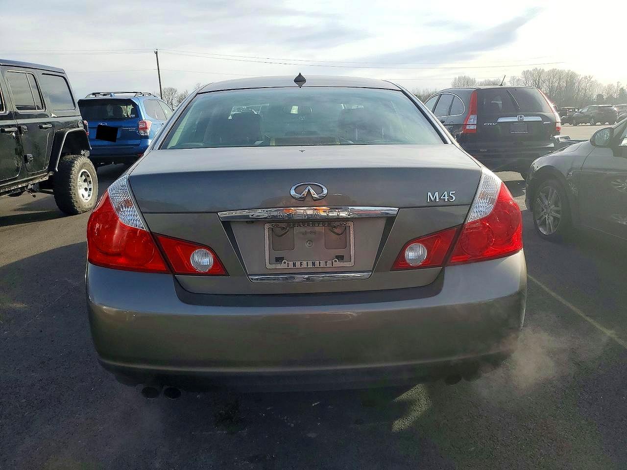 2006 Infiniti M45 Base Золотой vin: JNKBY01E26M208232