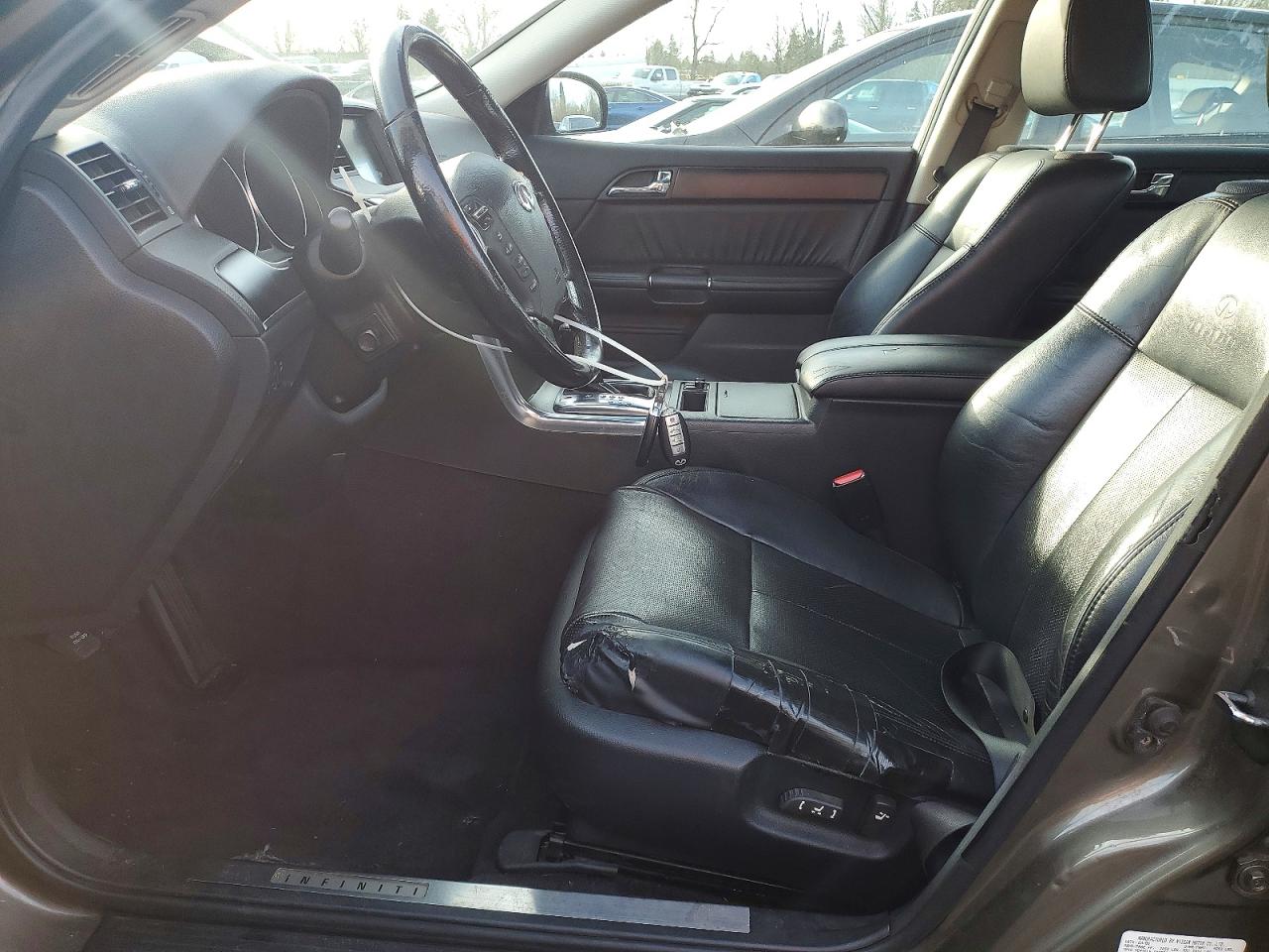 2006 Infiniti M45 Base Золотой vin: JNKBY01E26M208232