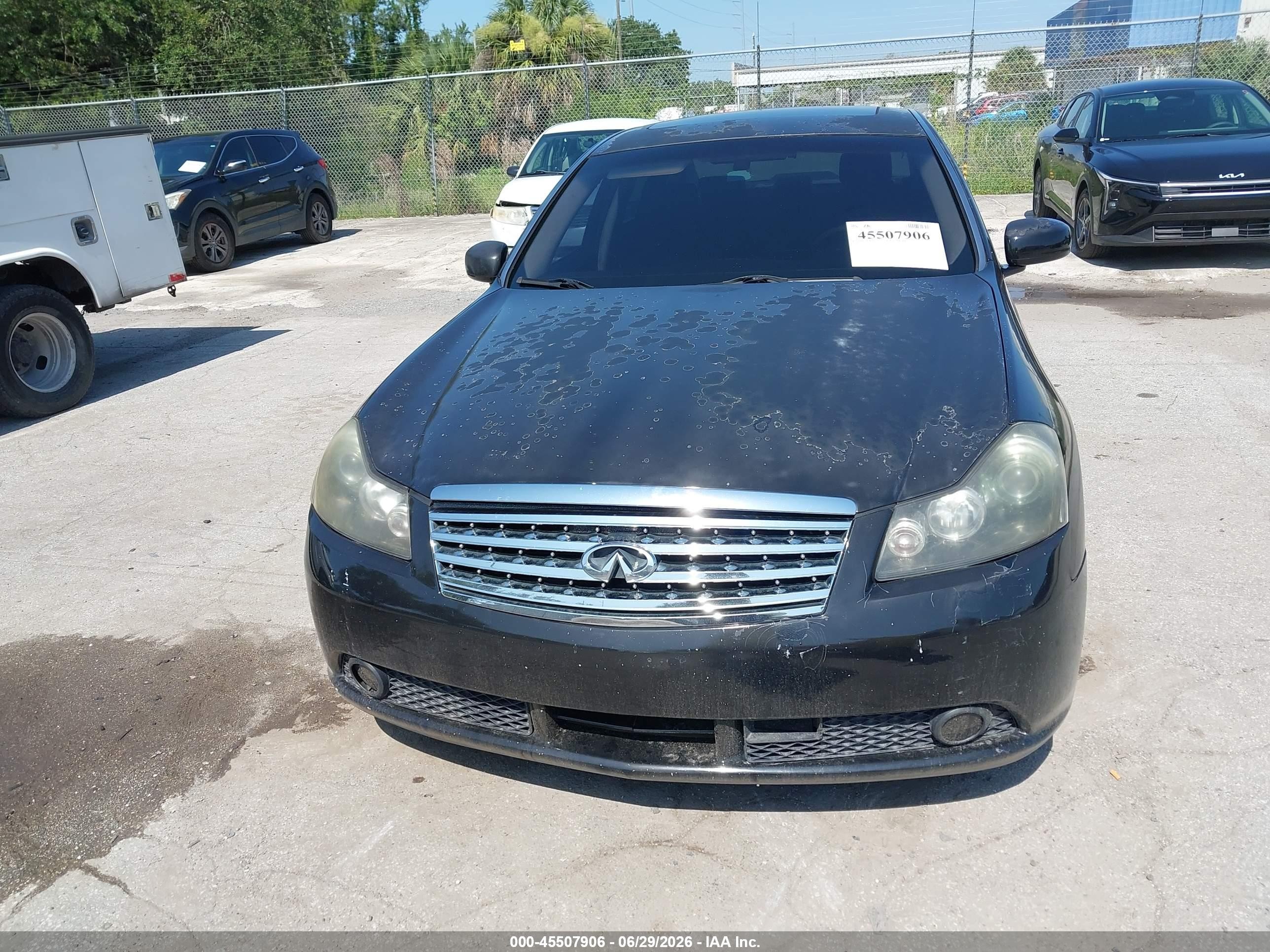 2006 Infiniti M45 Black vin: JNKBY01E76M207156