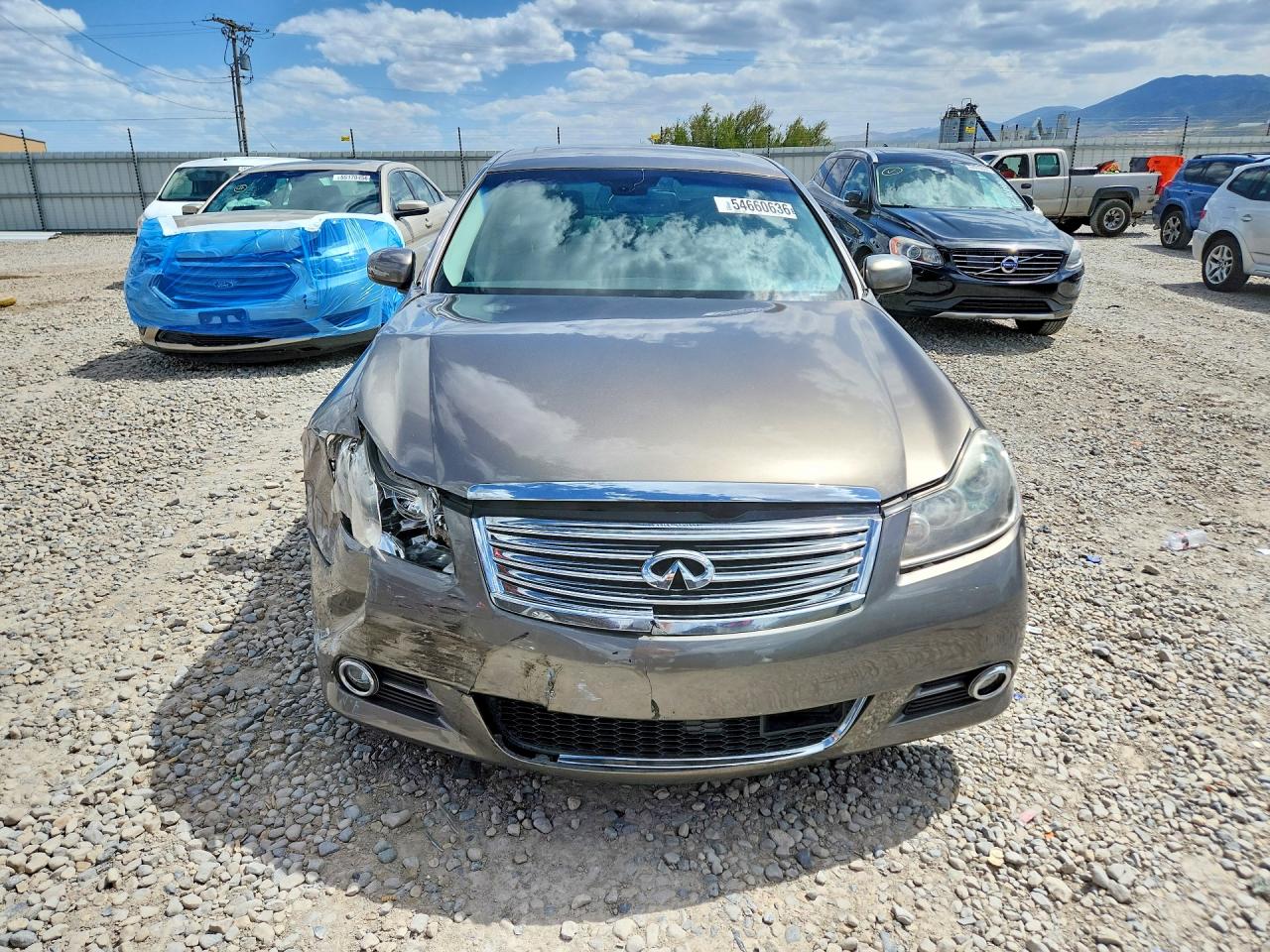 2008 Infiniti M45 X Tan vin: JNKBY01F48M551250