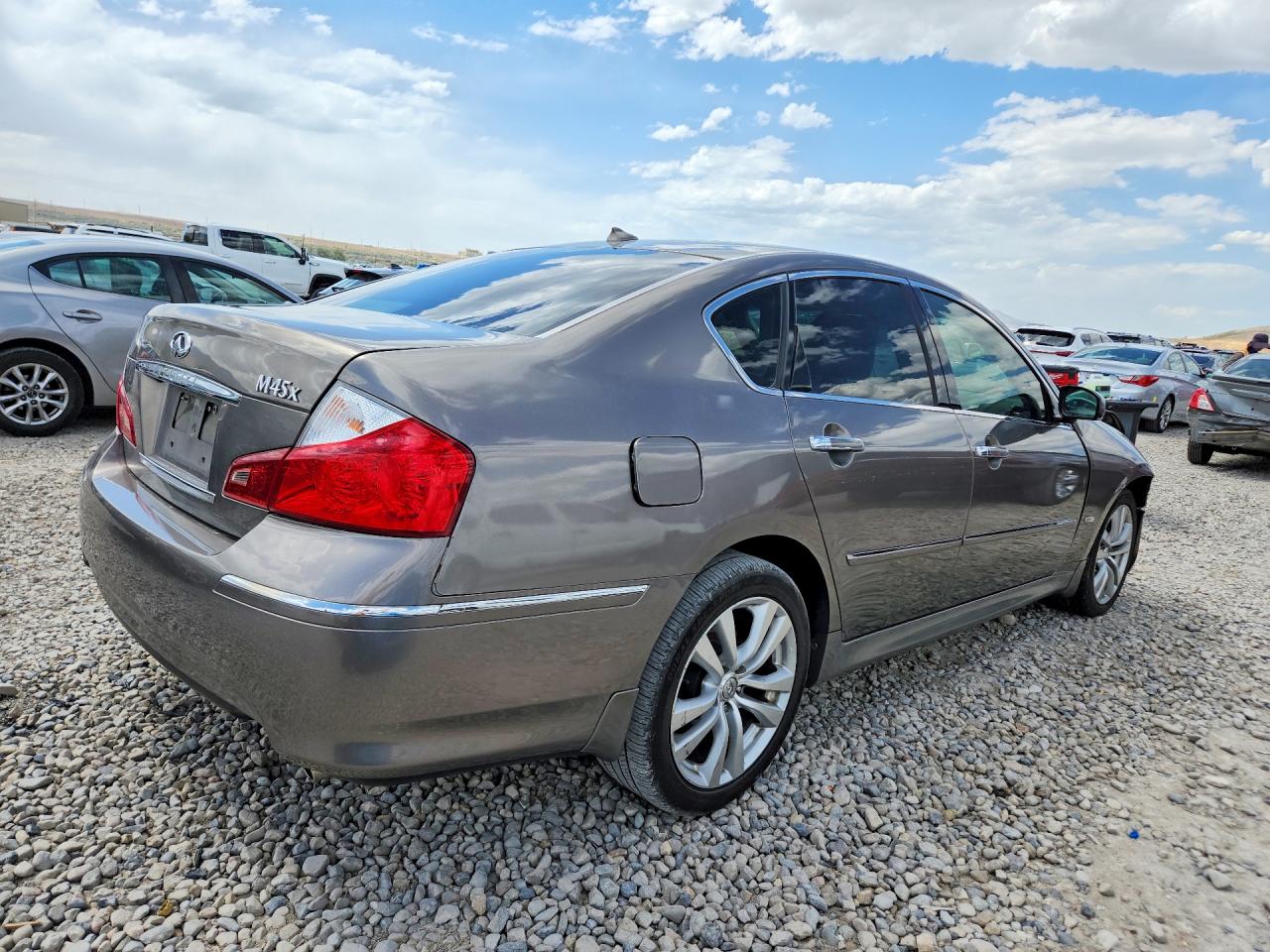 2008 Infiniti M45 X Tan vin: JNKBY01F48M551250