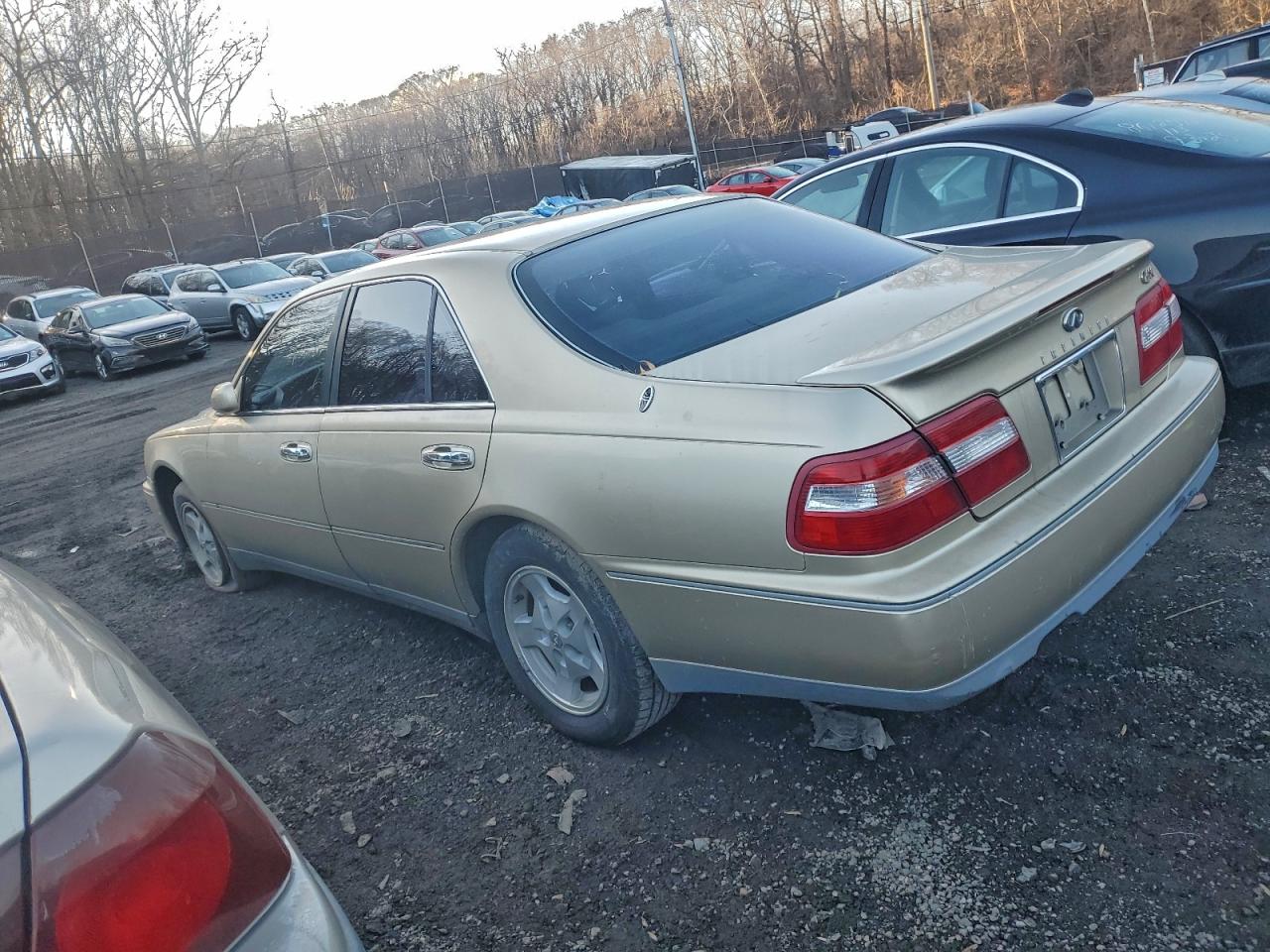 1998 Infiniti Q45 Base Gold vin: JNKBY31A8WM500417