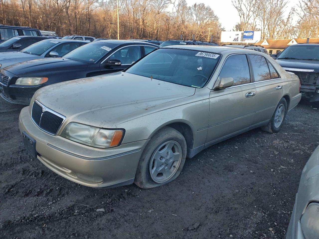 1998 Infiniti Q45 Base Gold vin: JNKBY31A8WM500417