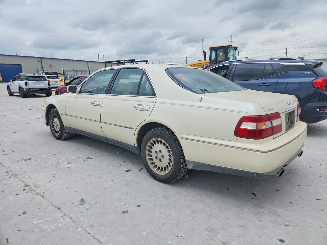 1998 Infiniti Q45 Base Cream vin: JNKBY31AXWM404398