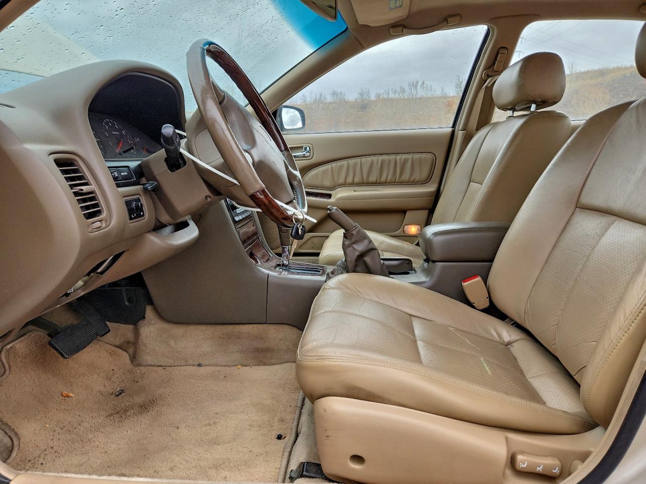 1999 Infiniti I30 Золотой vin: JNKCA21A2XT771127