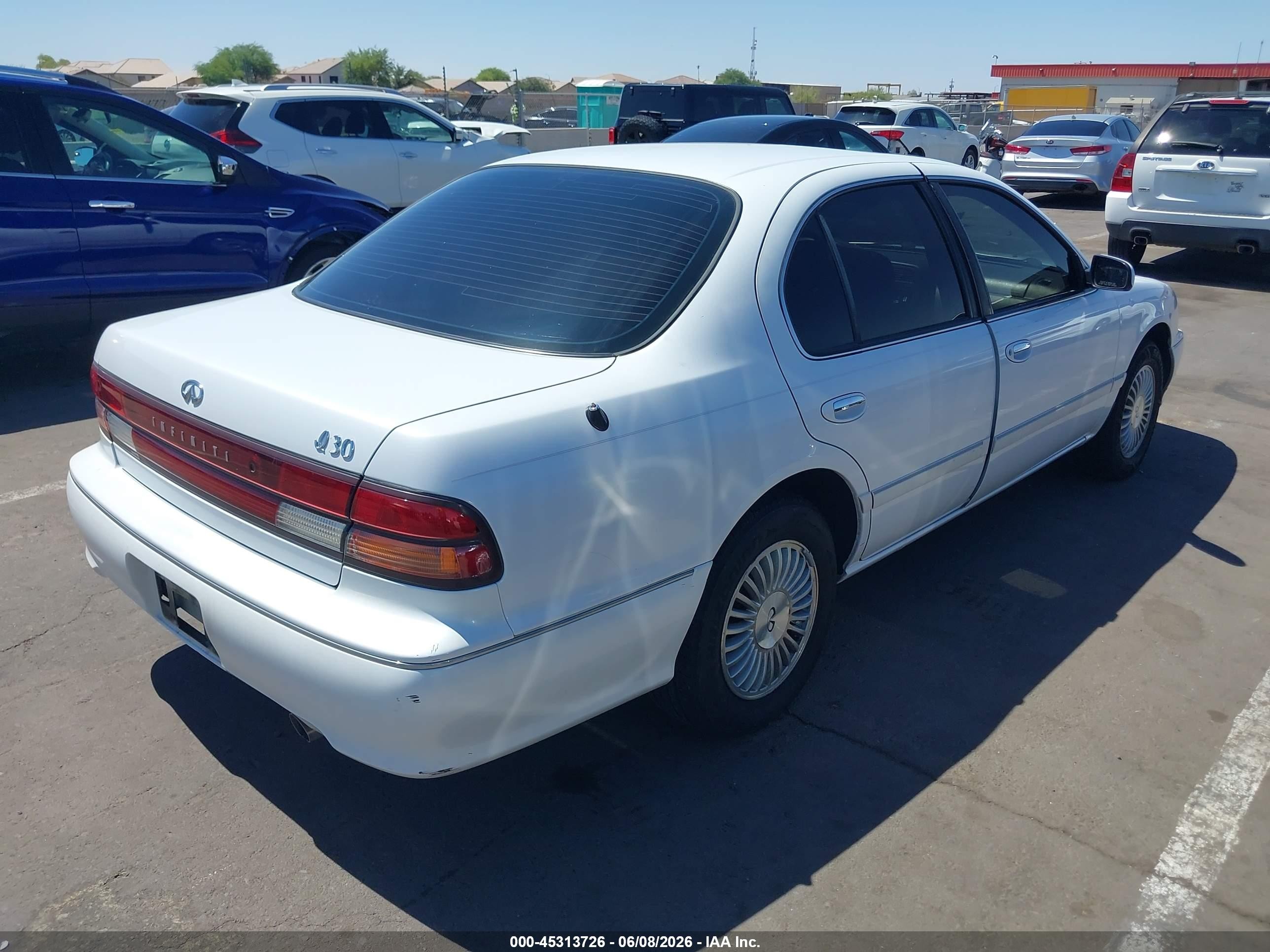 1997 Infiniti I30 Touring White vin: JNKCA21D7VT402271
