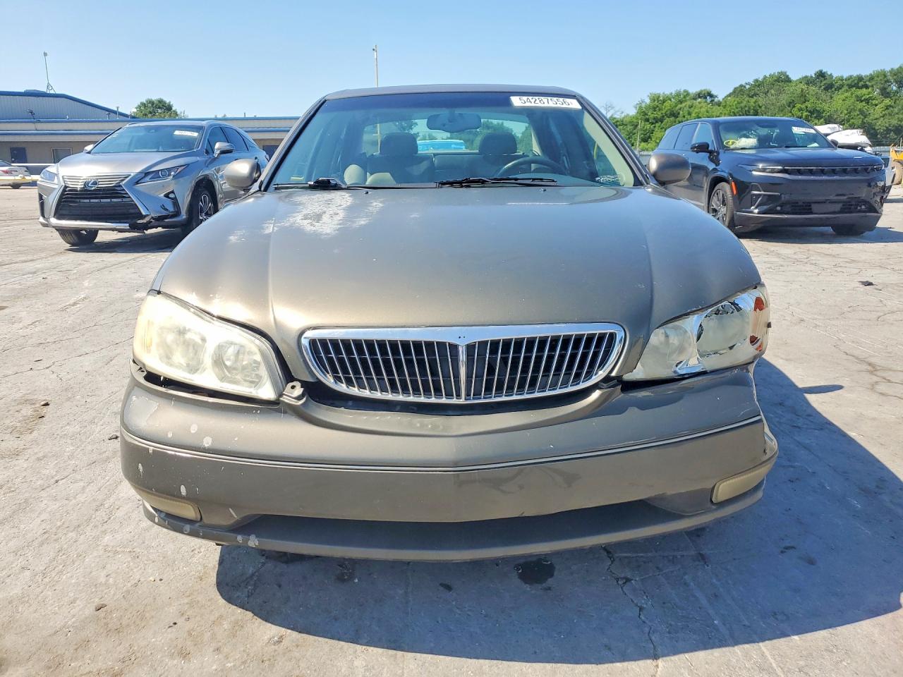 2000 Infiniti I30 Tan vin: JNKCA31A5YT206989