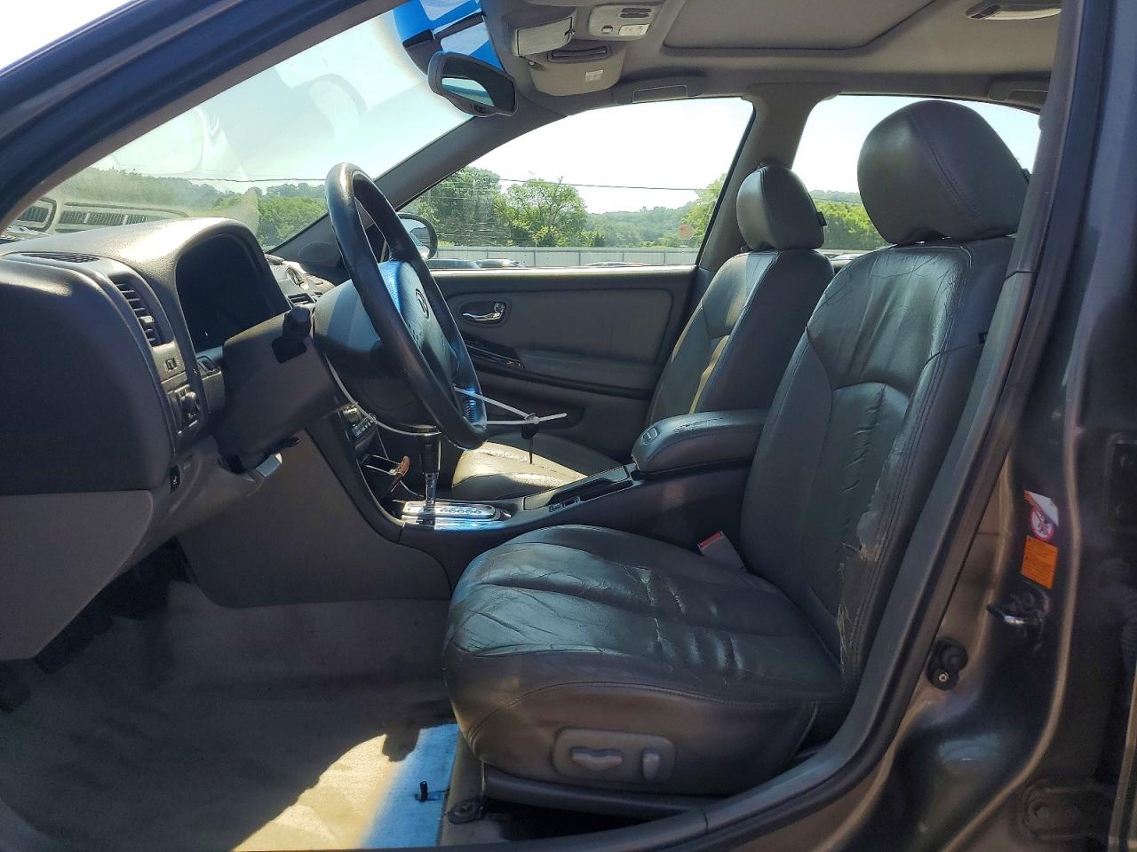 2000 Infiniti I30 Tan vin: JNKCA31A5YT206989