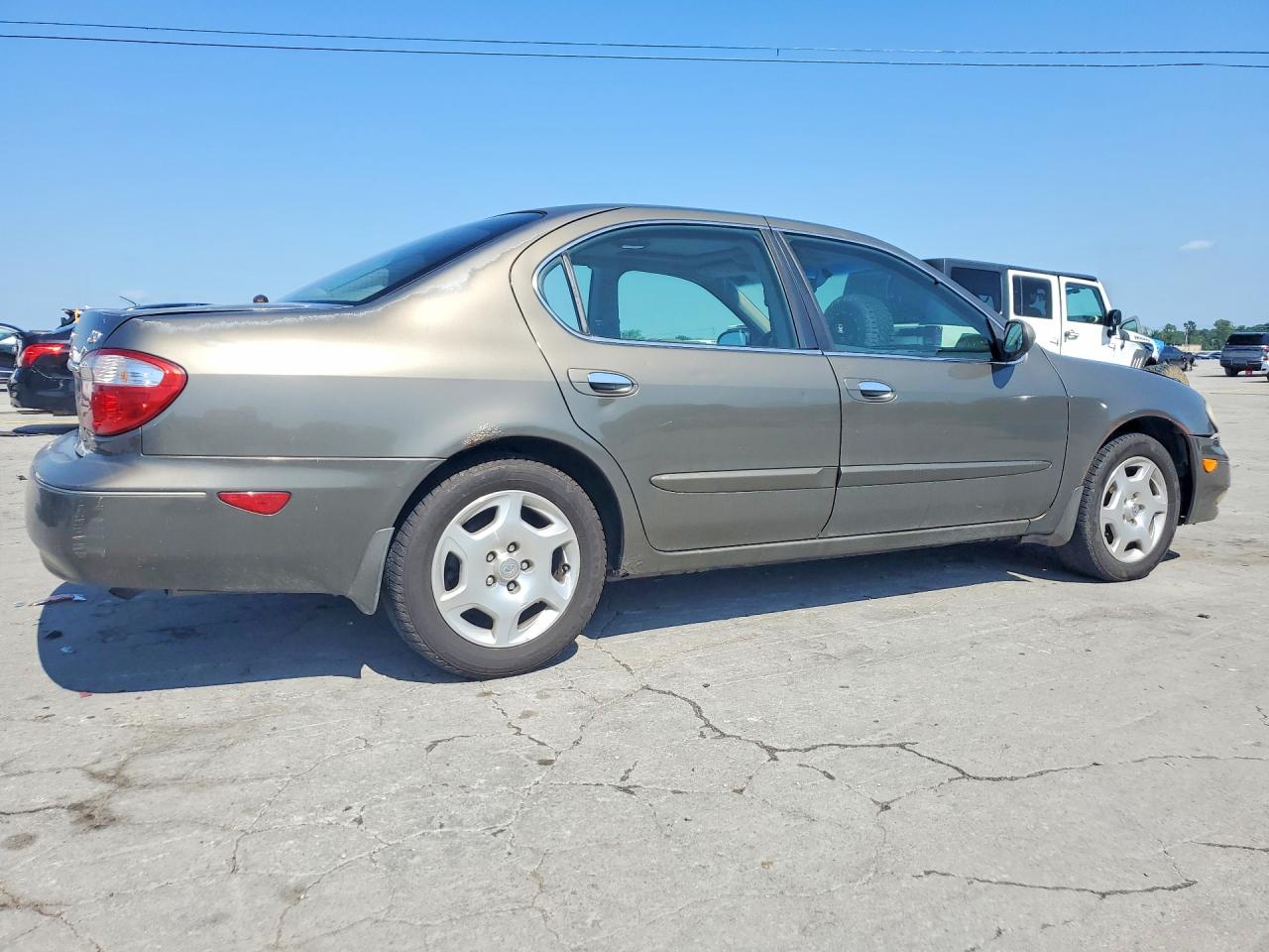2000 Infiniti I30 Tan vin: JNKCA31A5YT206989