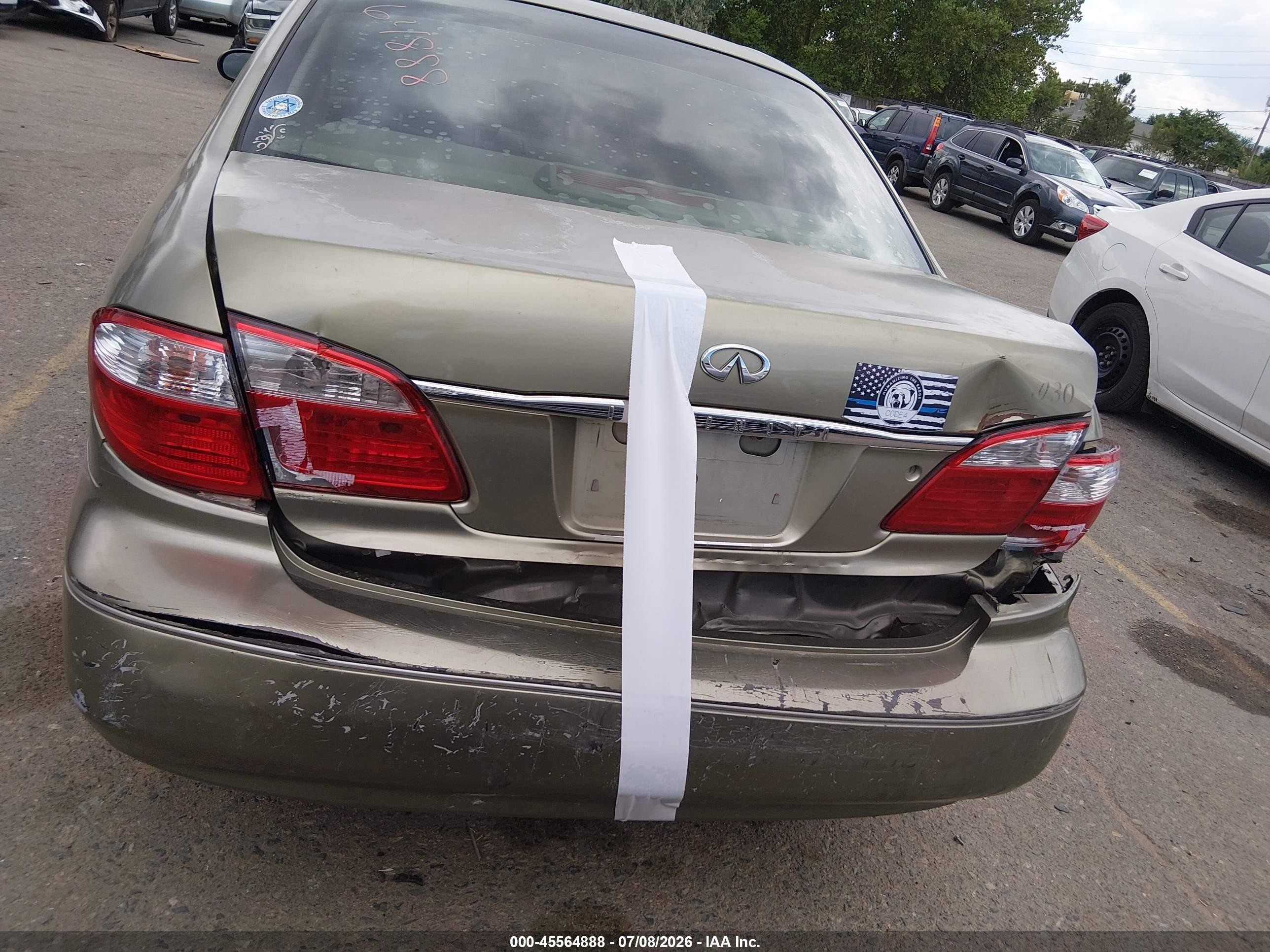 2001 Infiniti I30 Luxury Золотой vin: JNKCA31AX1T034433