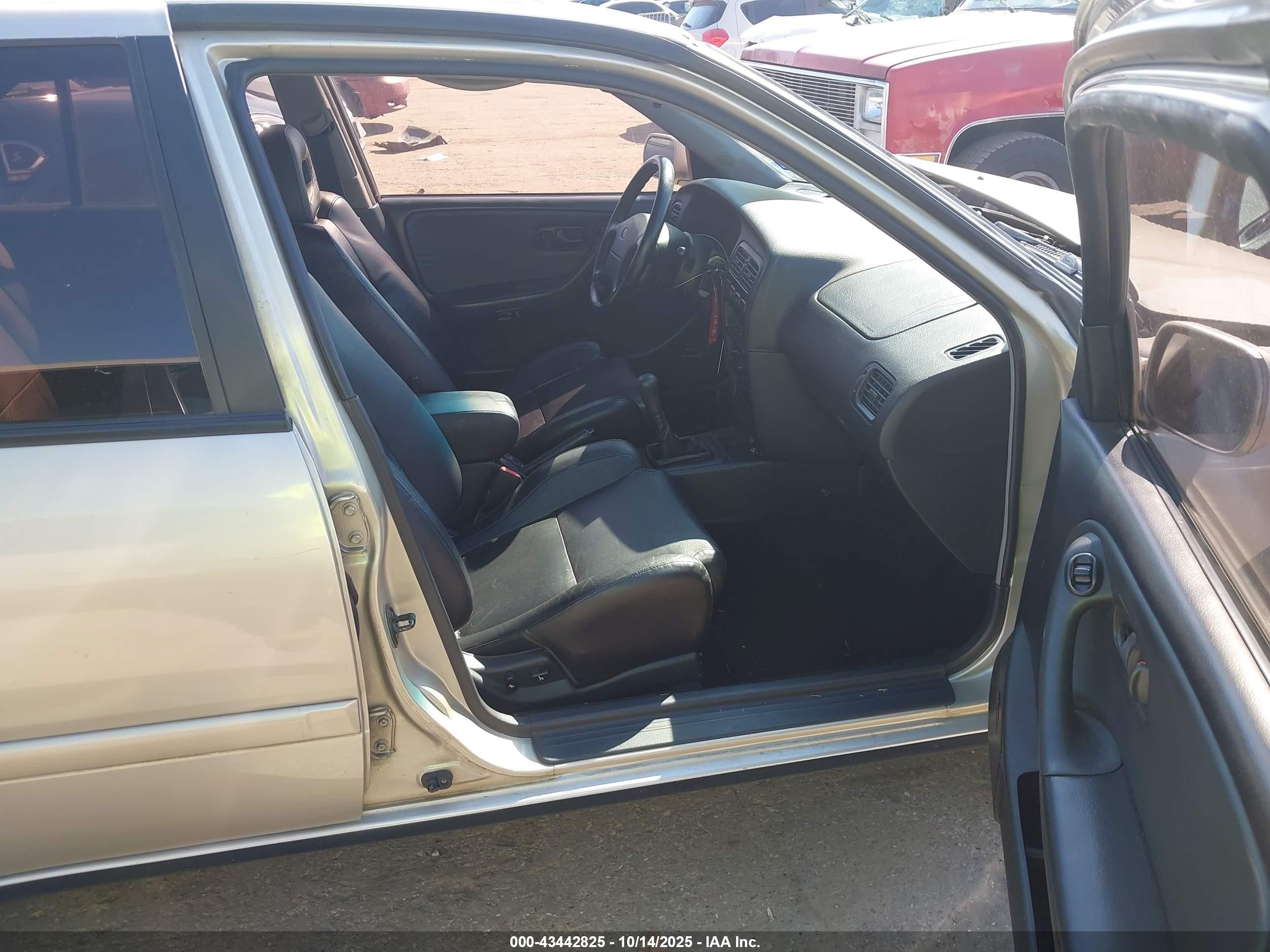 1995 Infiniti G20   Tan vin: JNKCP01D2ST518573