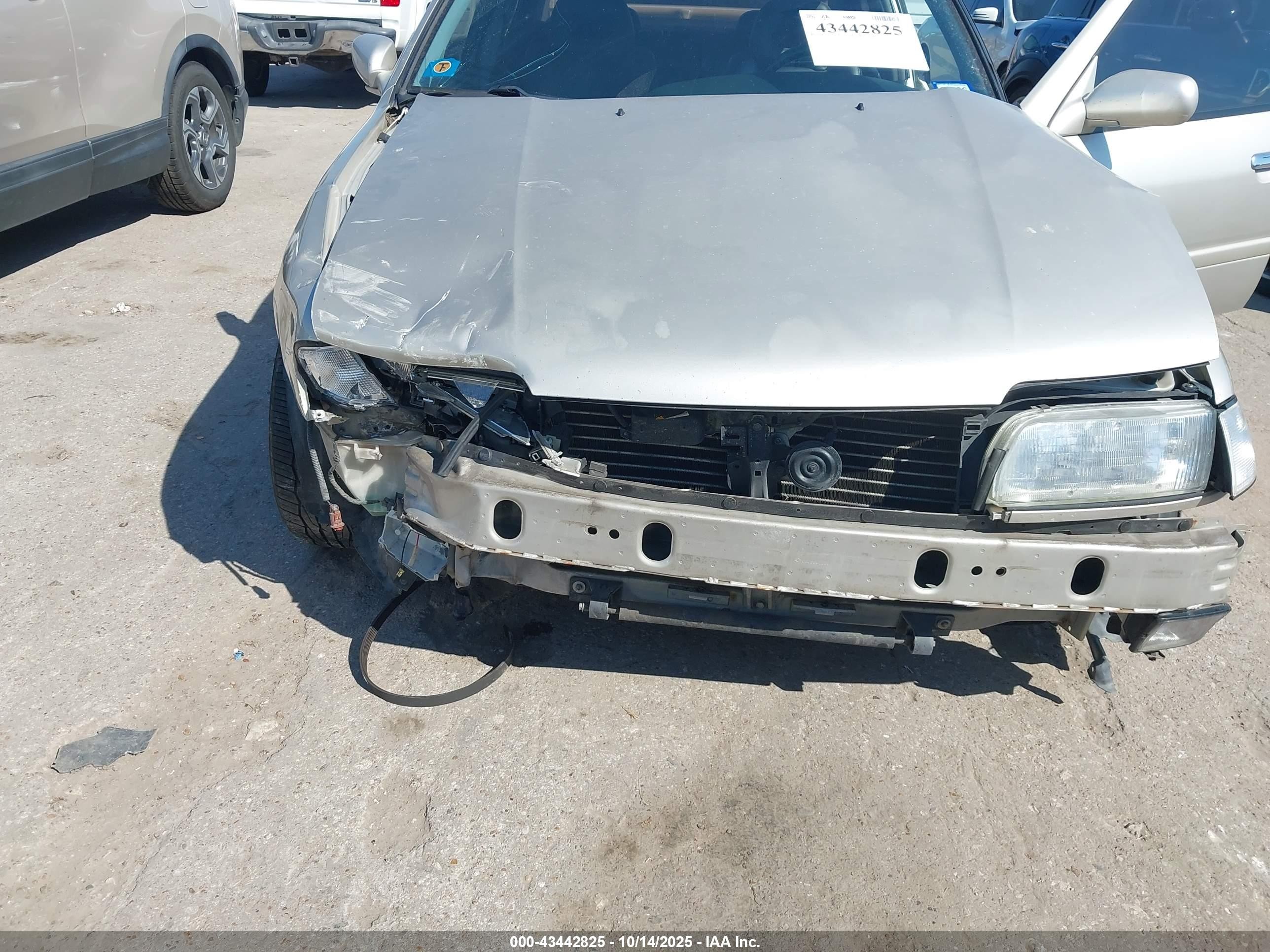 1995 Infiniti G20   Tan vin: JNKCP01D2ST518573