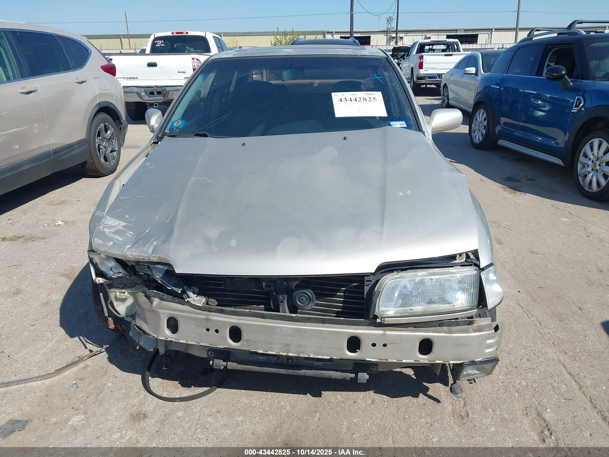 1995 Infiniti G20   Tan vin: JNKCP01D2ST518573