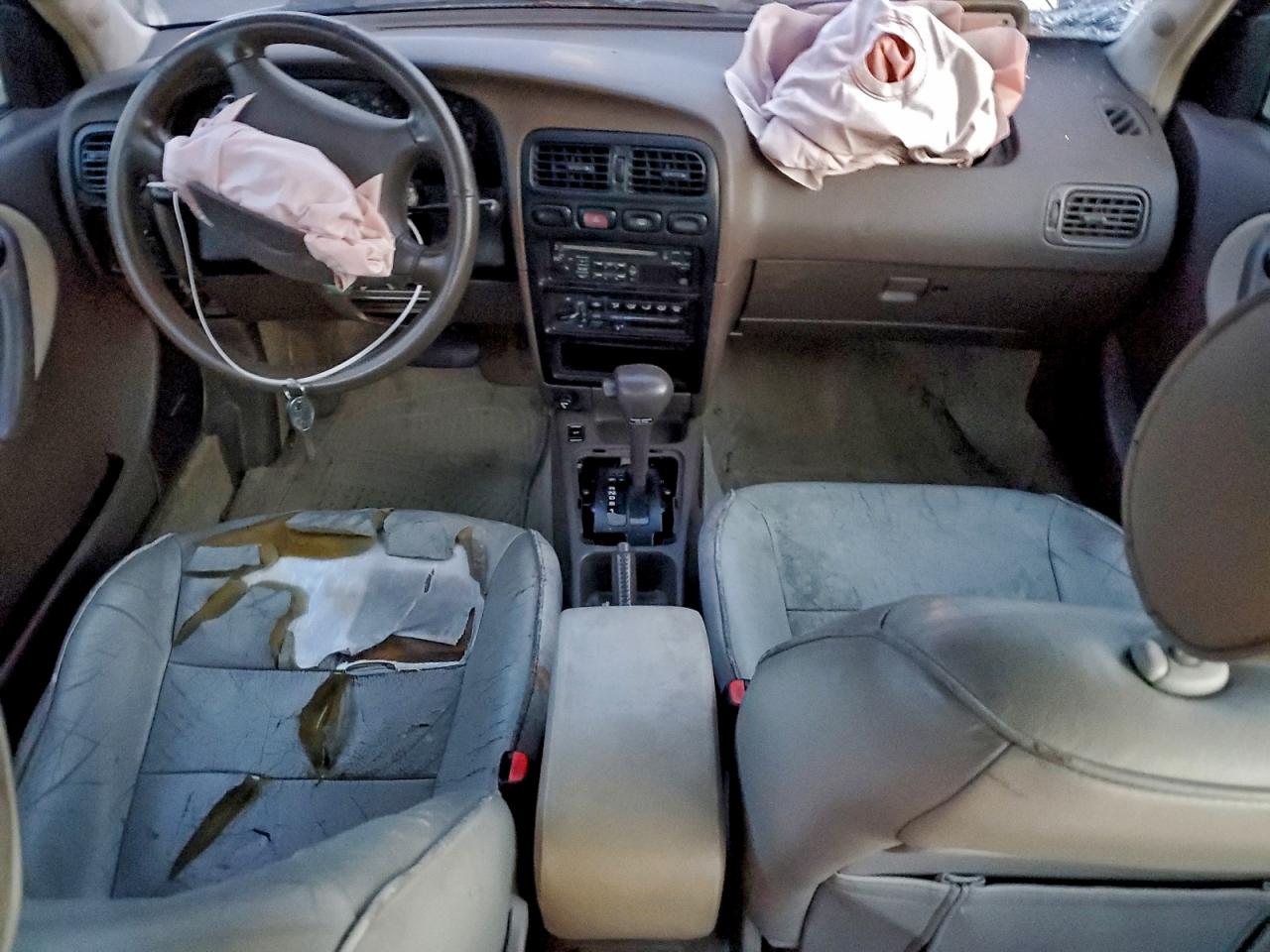 1995 Infiniti G20 Beige vin: JNKCP01D3ST520980