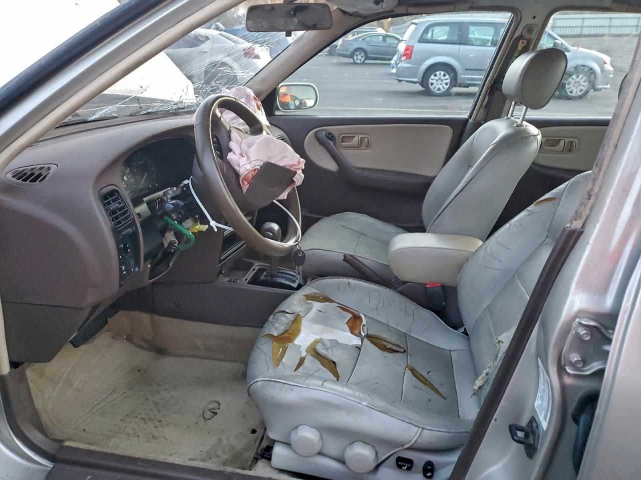 1995 Infiniti G20 Beige vin: JNKCP01D3ST520980
