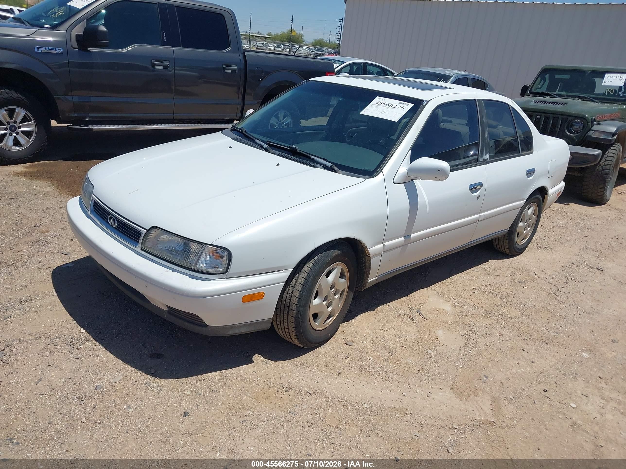 1995 Infiniti G20   White vin: JNKCP01D5ST527574