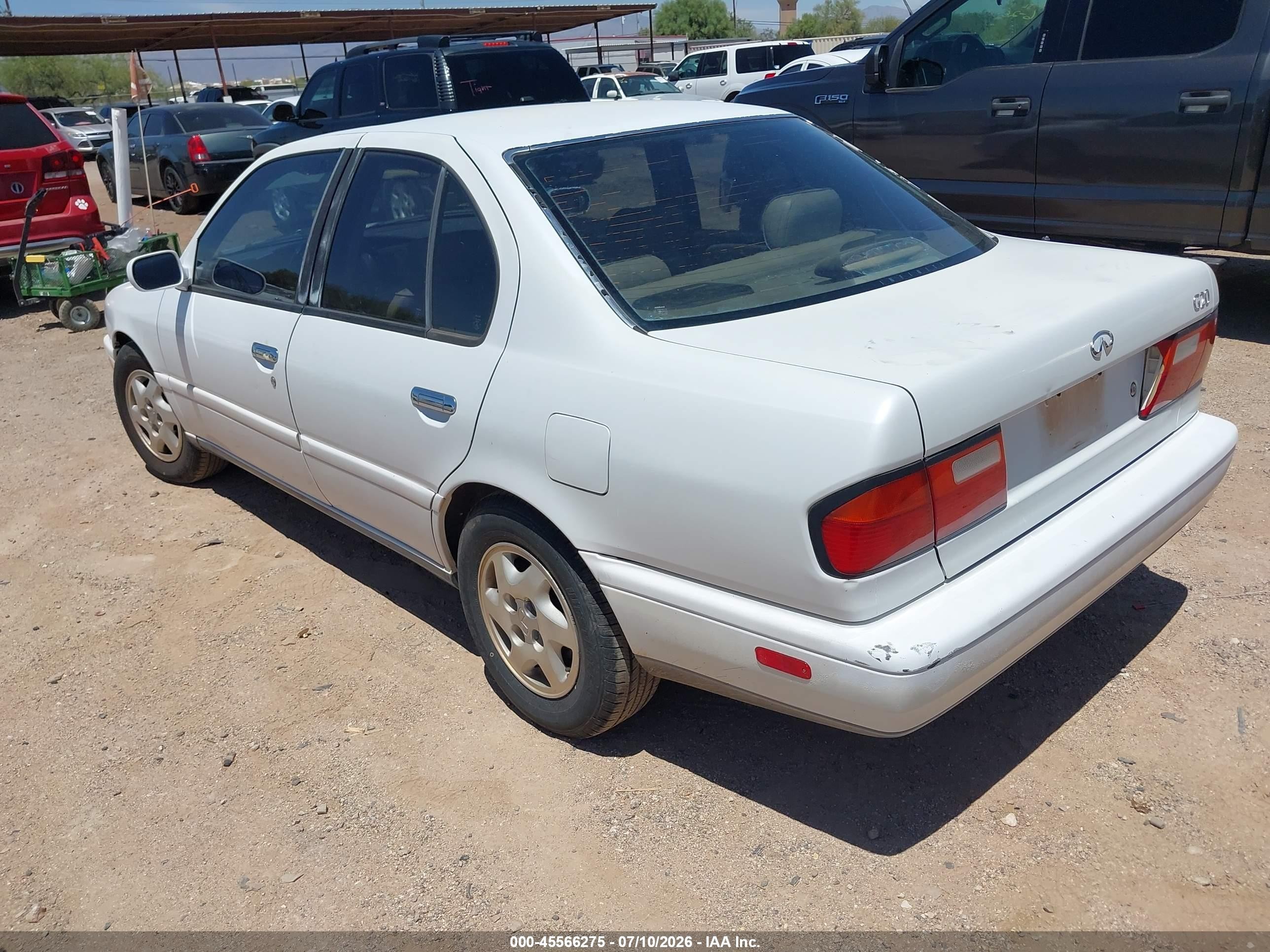 1995 Infiniti G20   White vin: JNKCP01D5ST527574