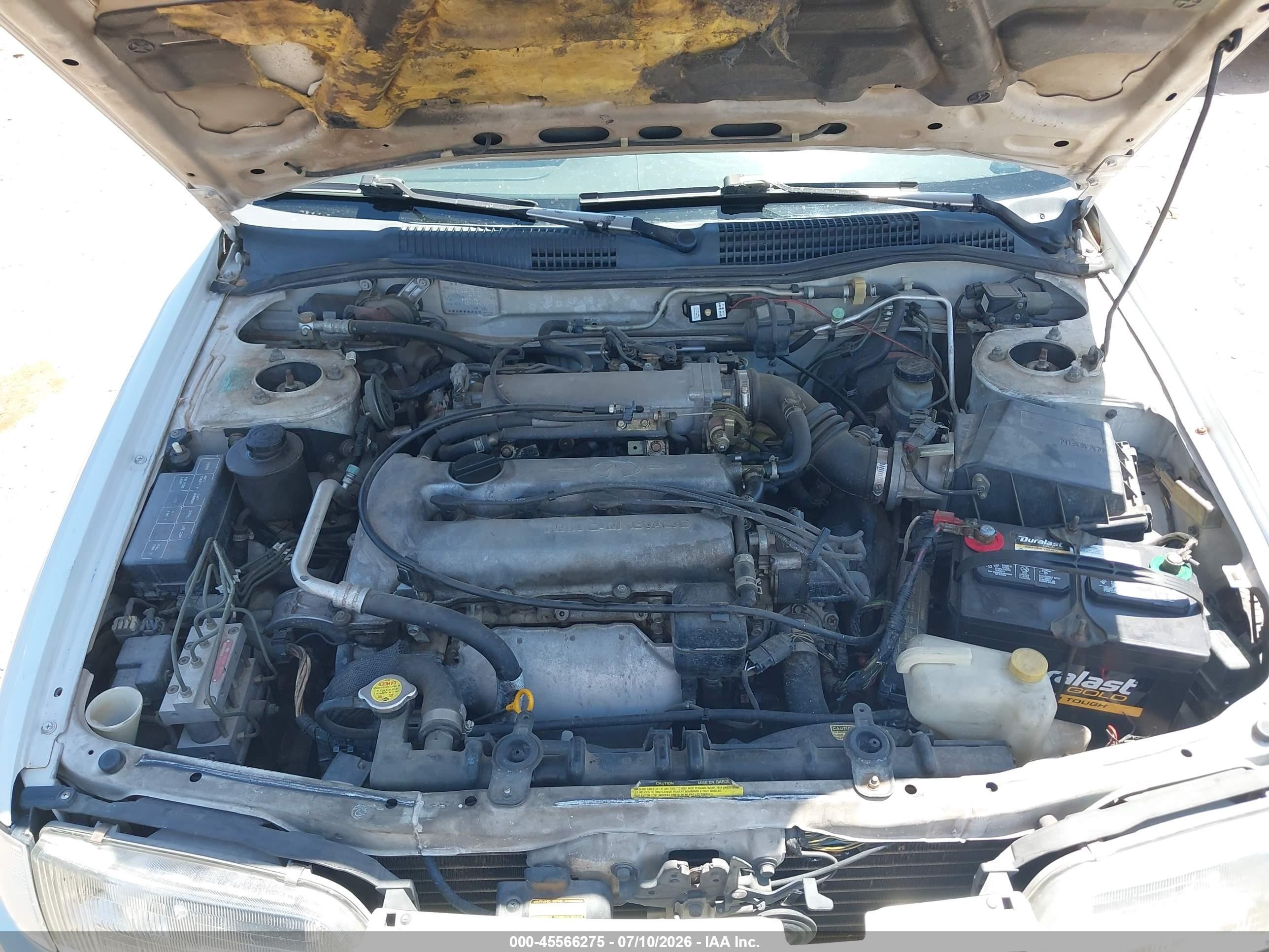 1995 Infiniti G20   White vin: JNKCP01D5ST527574