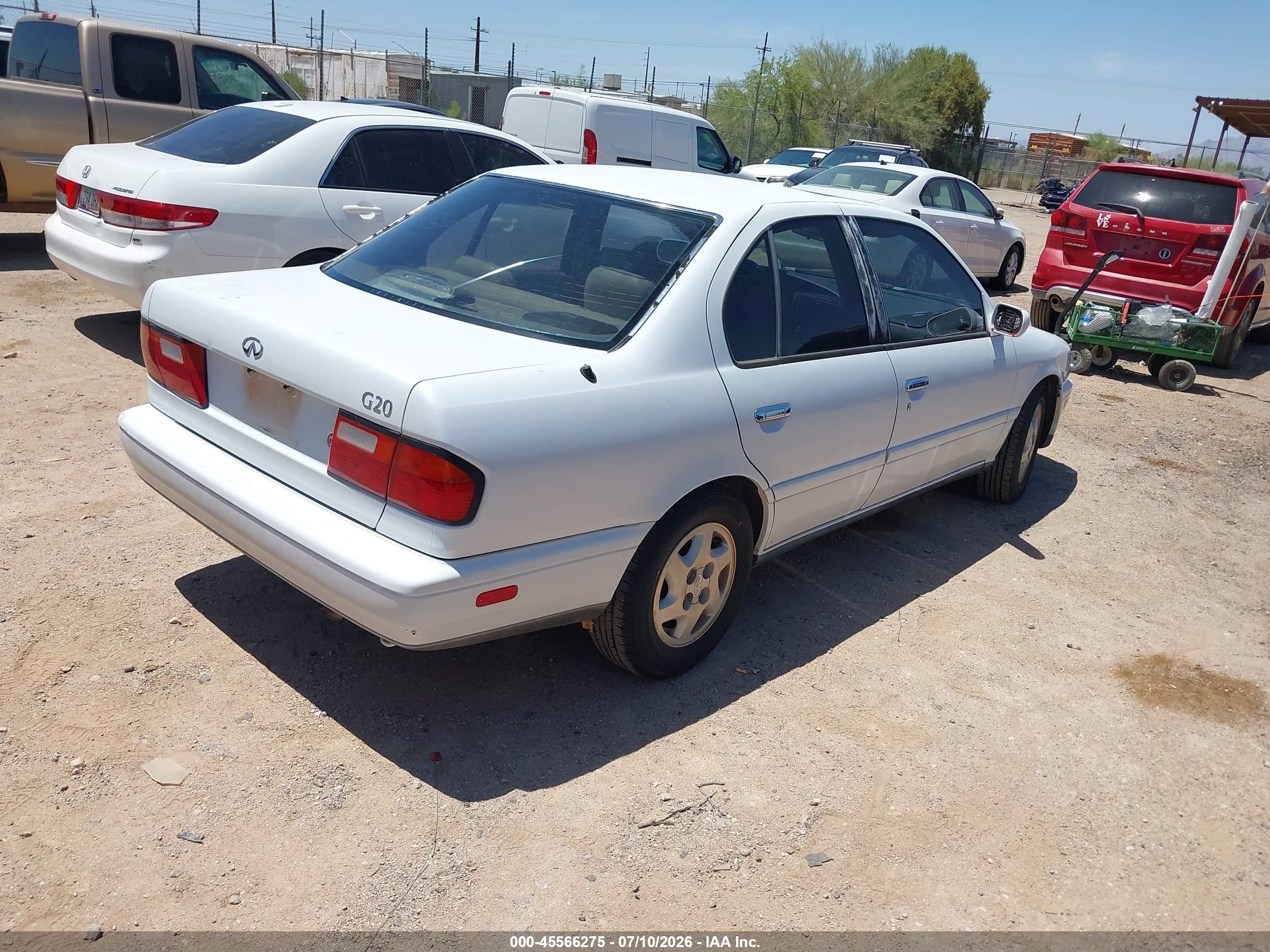 1995 Infiniti G20   White vin: JNKCP01D5ST527574