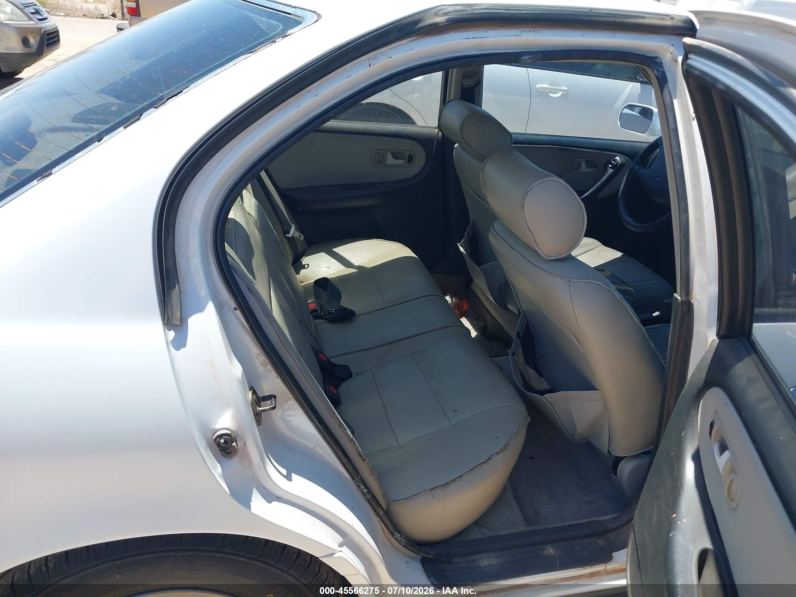 1995 Infiniti G20   White vin: JNKCP01D5ST527574